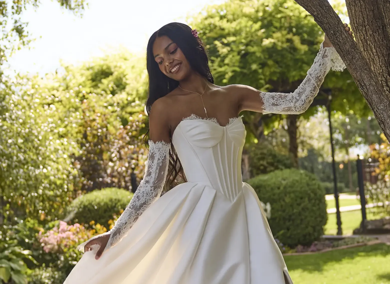 Model Outside Wearing Zorina Corsetry-Inspired Wedding Dress By Rebecca Ingram
