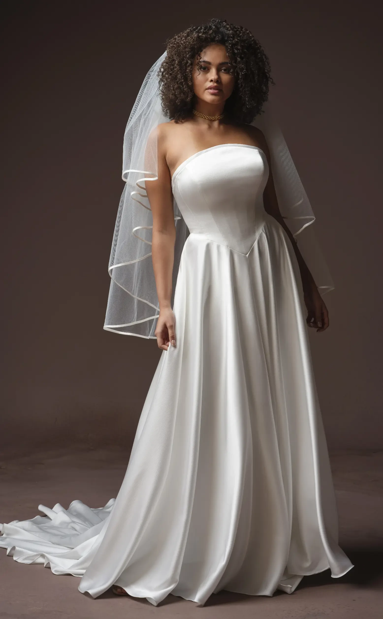 Model Wearing Simple Crepe Wedding Dress Called Tiffany By Maggie Sottero