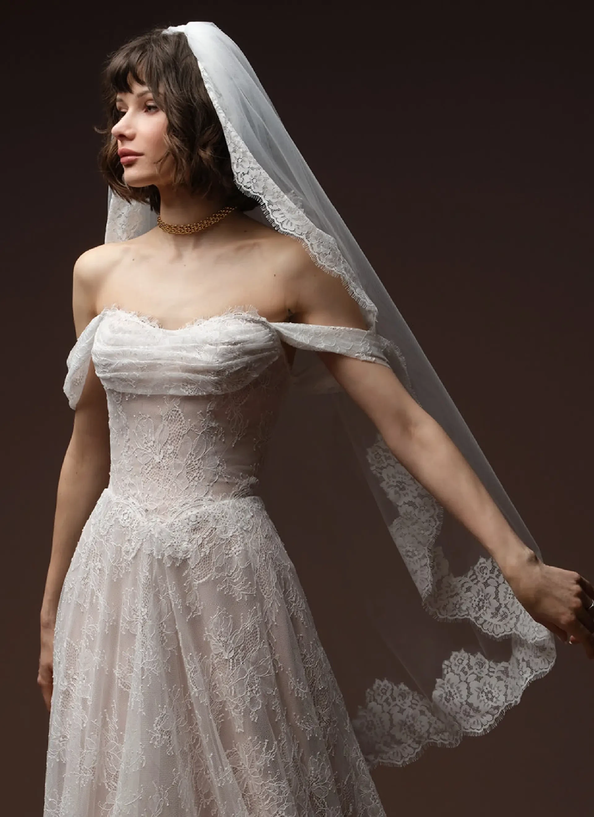 Model In A Studio Wearing Scattered Pearl Veil By Maggie Sottero