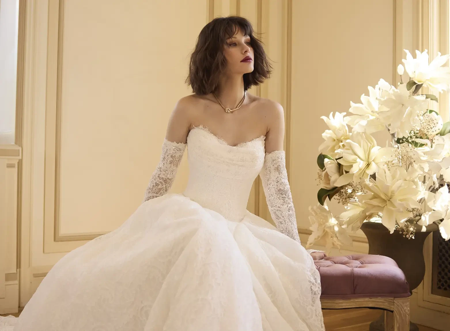 Model In A Studio Wearing Lace Scoop Neck Wedding Dress Called Tamar By Sottero And Midgley