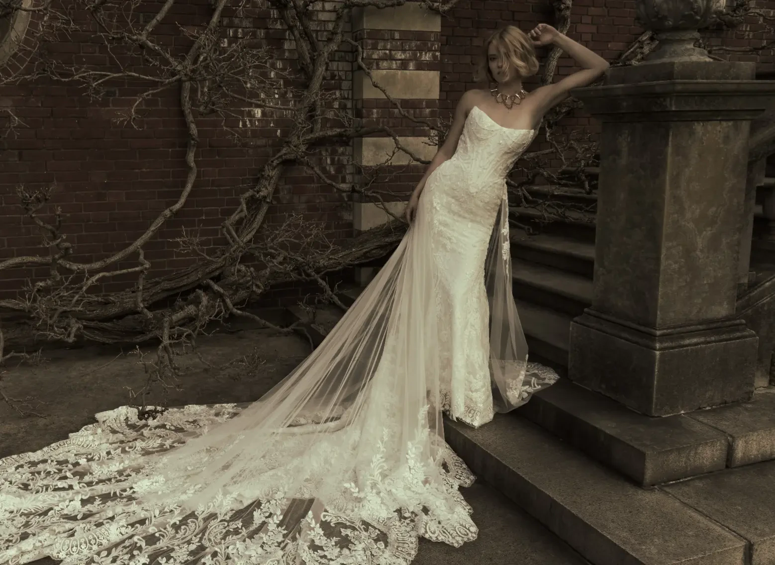 Model By Stairs Wearing Lace Mermaid Wedding Dress Called Eirawen By Sottero And Midgley