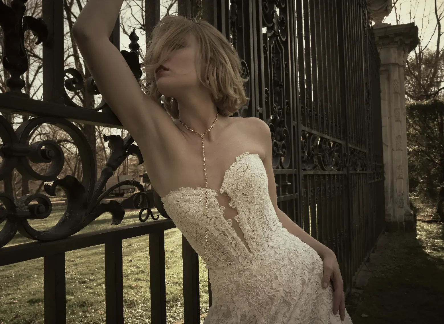 Model Wearing Lace Plunging Neckline Wedding Dress Called Keeva By Sottero And Midgley