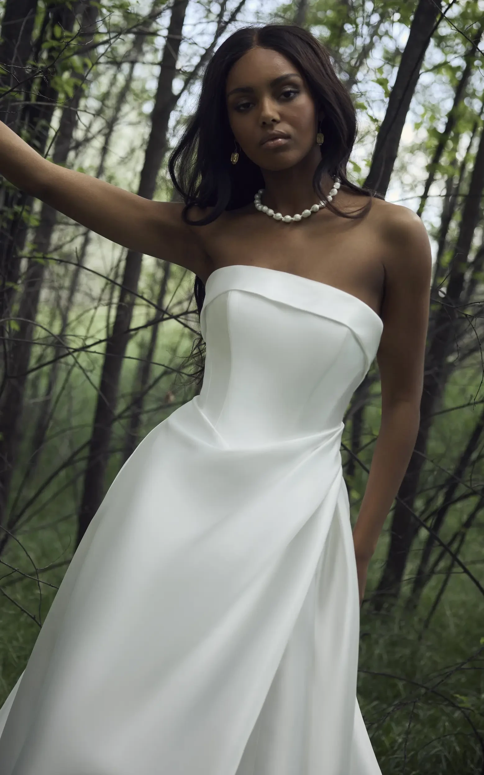 Model Wearing Simple A-line Wedding Dress Called Agatha By Rebecca Ingram