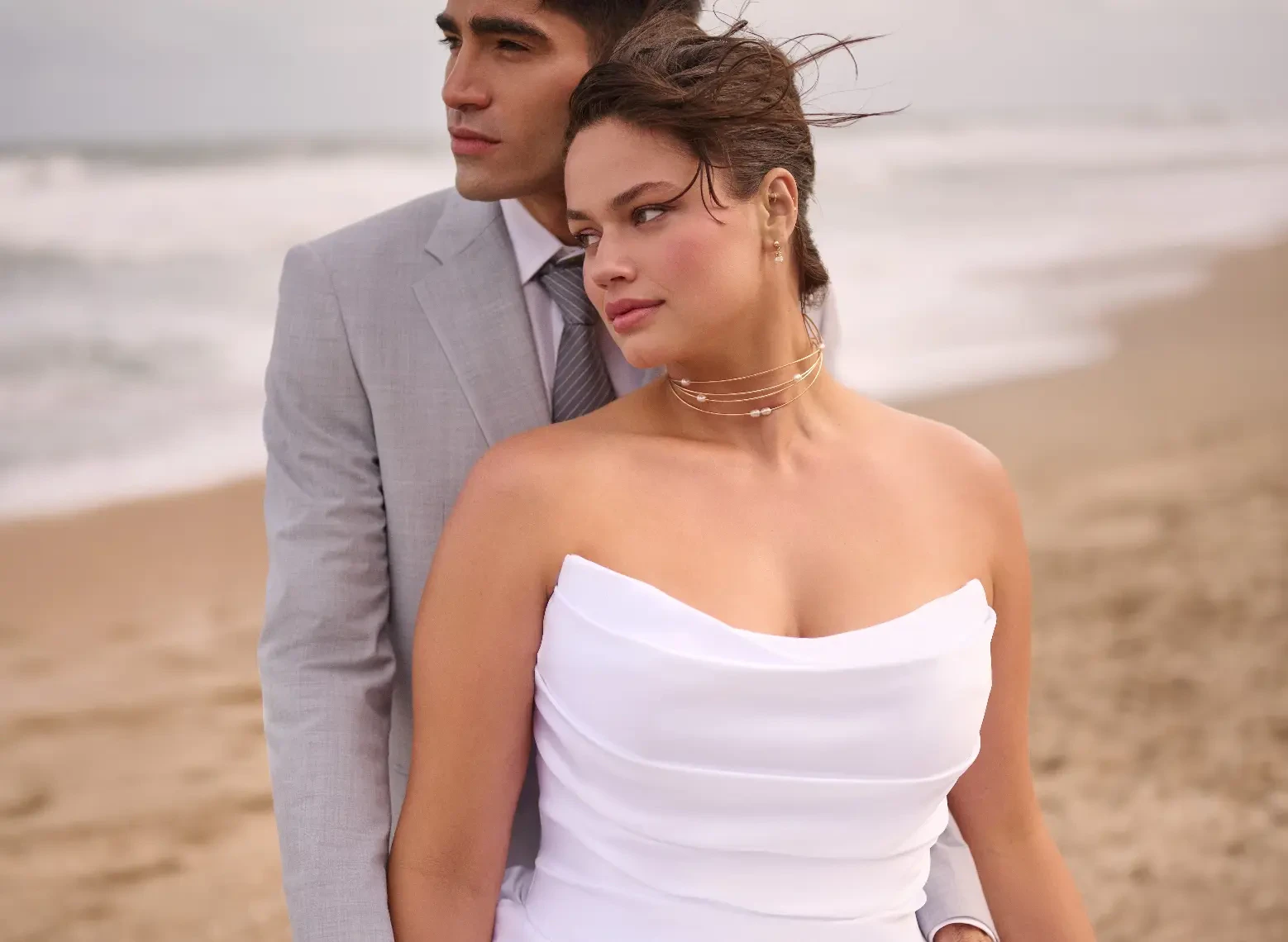 Model In A Studio Wearing Satin Wedding Dress And A Veil Called Maureen By Maggie Sottero