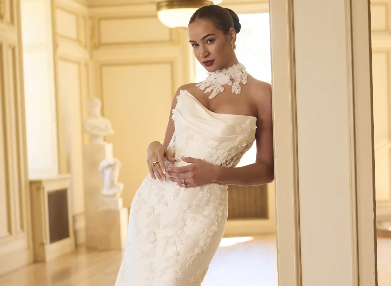 Model In A Studio Wearing Sexy CatEye Neckline Wedding Dress Called Burke By Sottero And Midgley