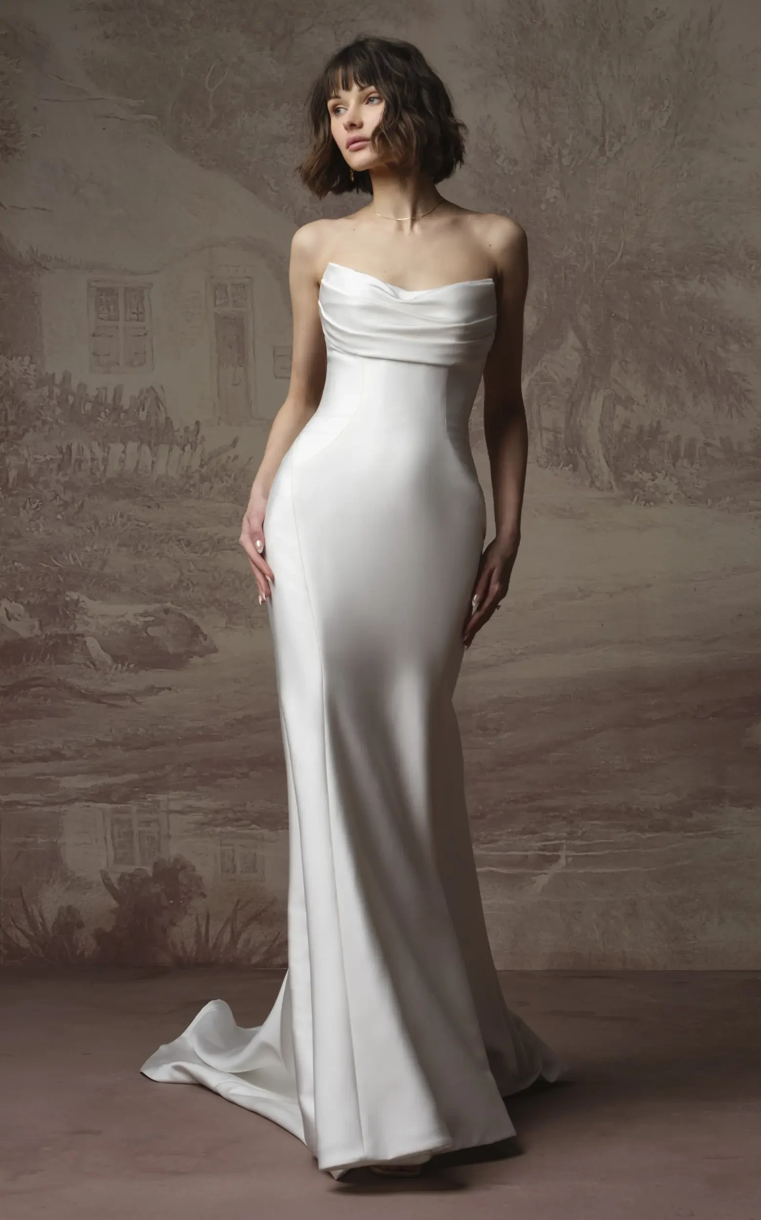 Model In Studio Wearing Simple Wedding Dress Called Kayla By Rebecca Ingram