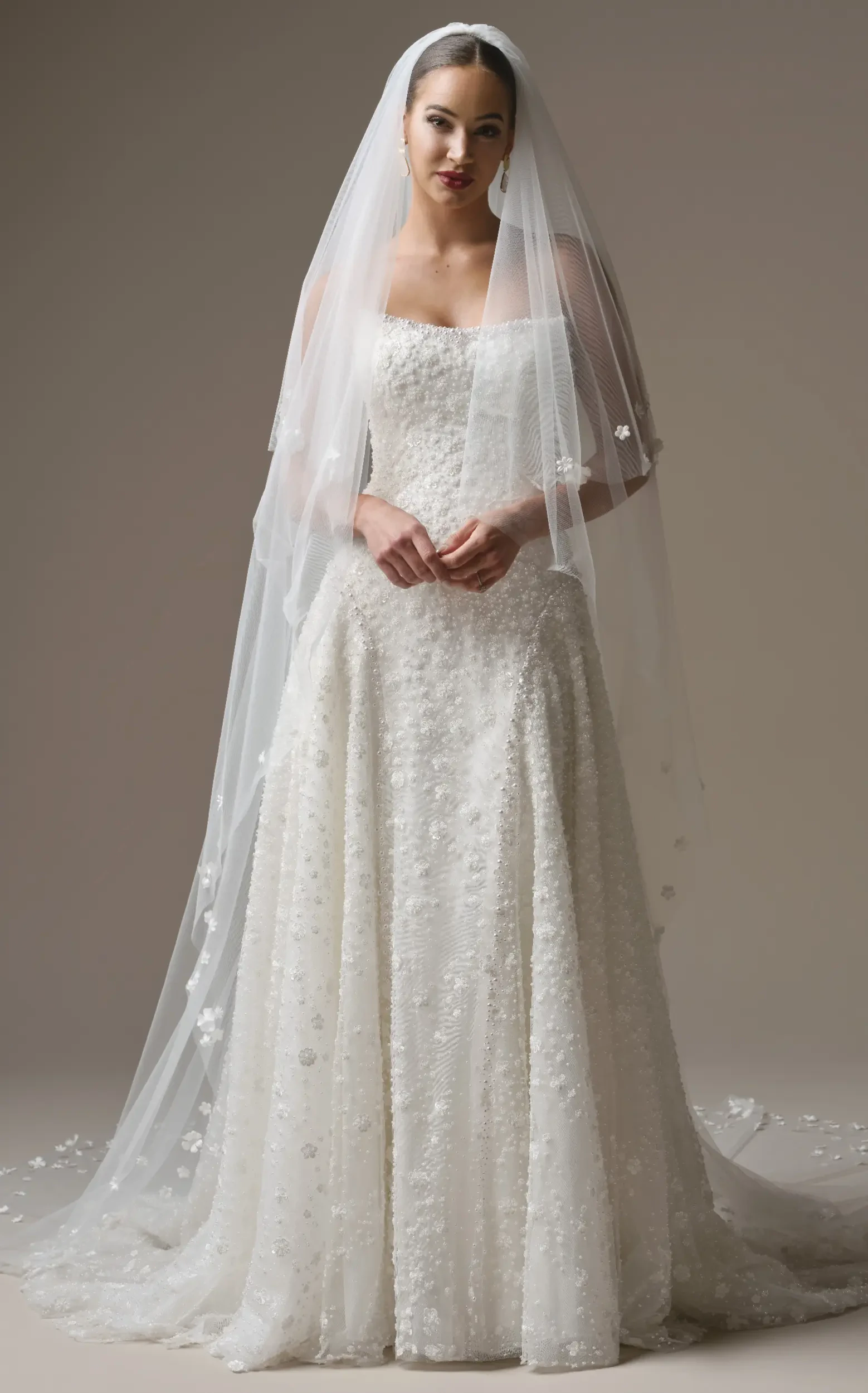 Model In A Studio Wearing 3D Lace Wedding Dress Called Marceline By Sottero And Midgley