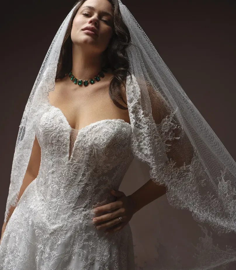 Bride Wearing Simple Beaded Wedding Dress With Veil Called Zurielle By Maggie Sottero