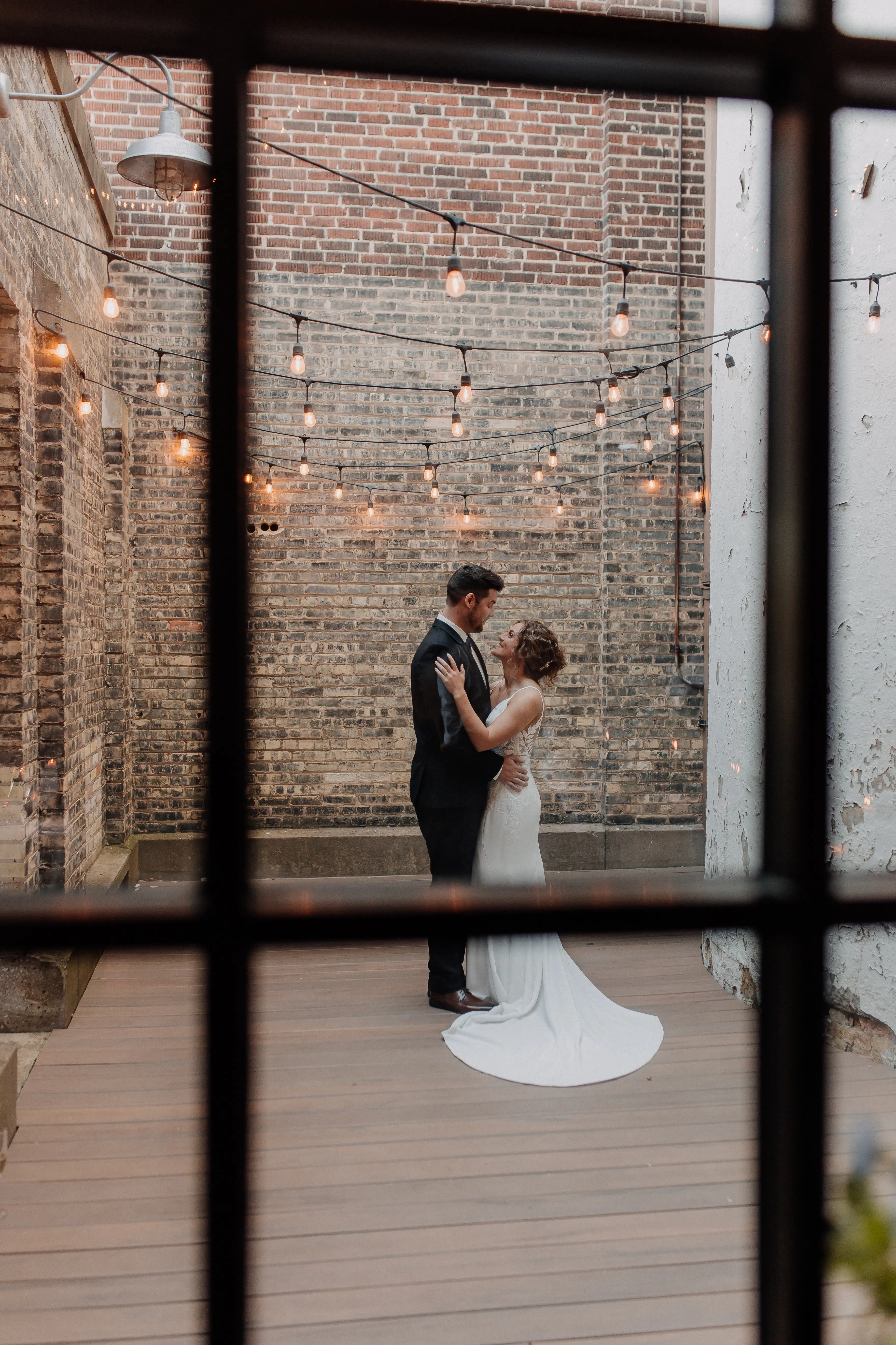 Bride wearing Dionne by Rebecca Ingram dancing with her husband