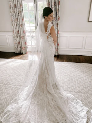 Bride Wearing Lace Backless Wedding Dress Called Chauncey By Sottero And Midgley