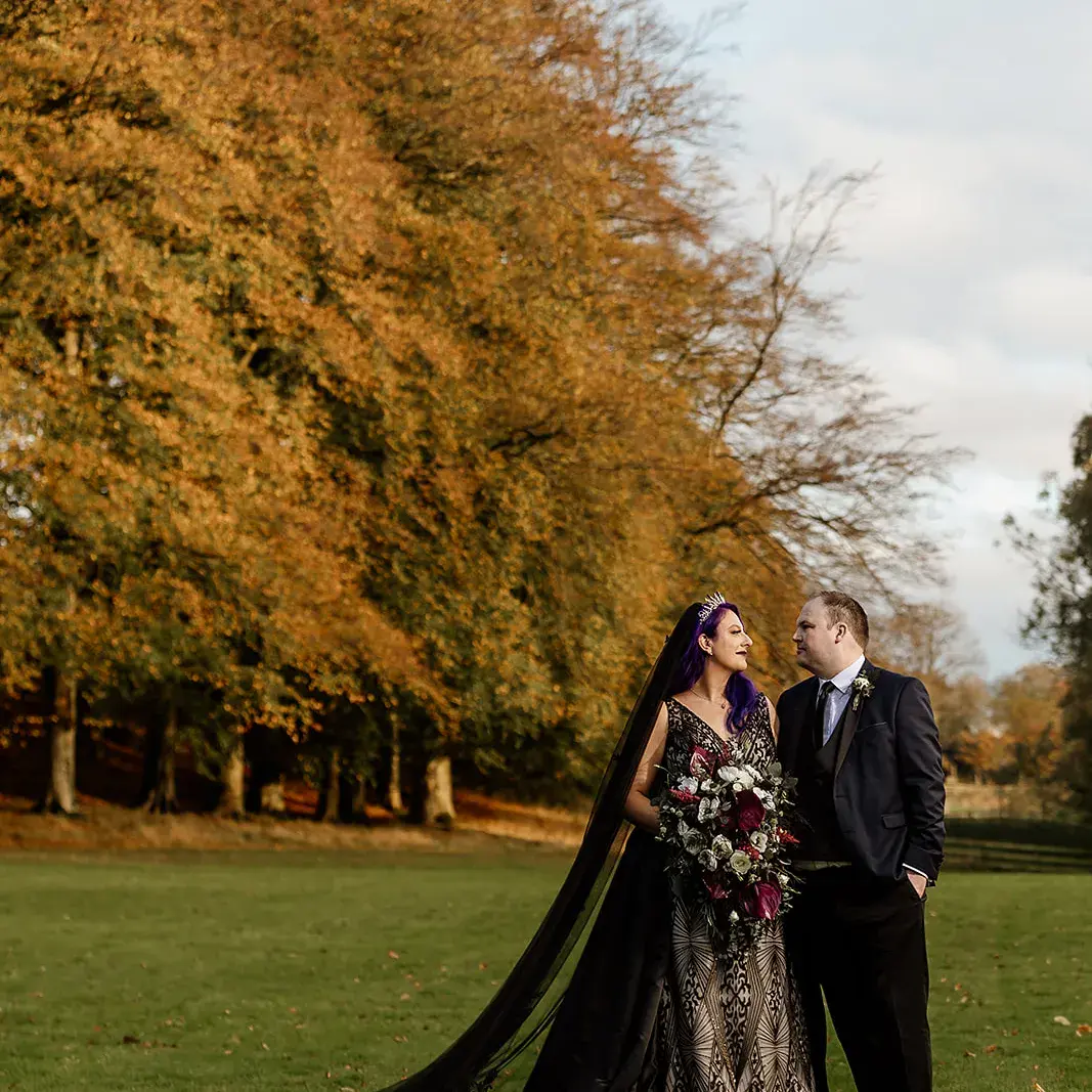 Bride In Art Deco Black Elaine By Maggie Sottero With Groom
