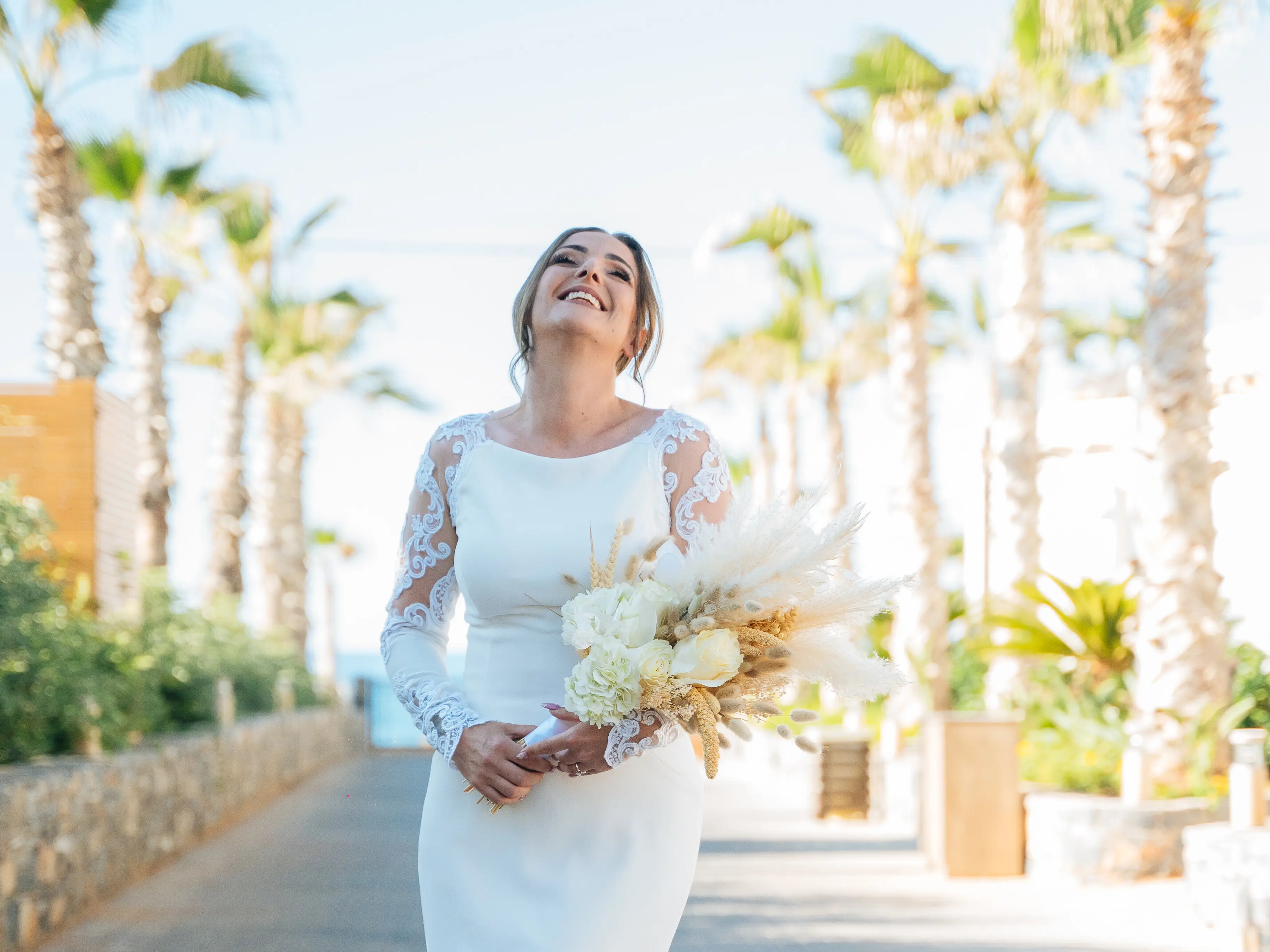 Real Bride in Minimalist Crepe Long Sleeve Lace Sheath Wedding Dress Called Bethany by Rebecca Ingram