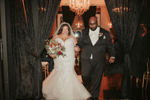 Bride Walking With Groom Wearing Wedding Dress Called Alistaire Lynette by Maggie Sottero