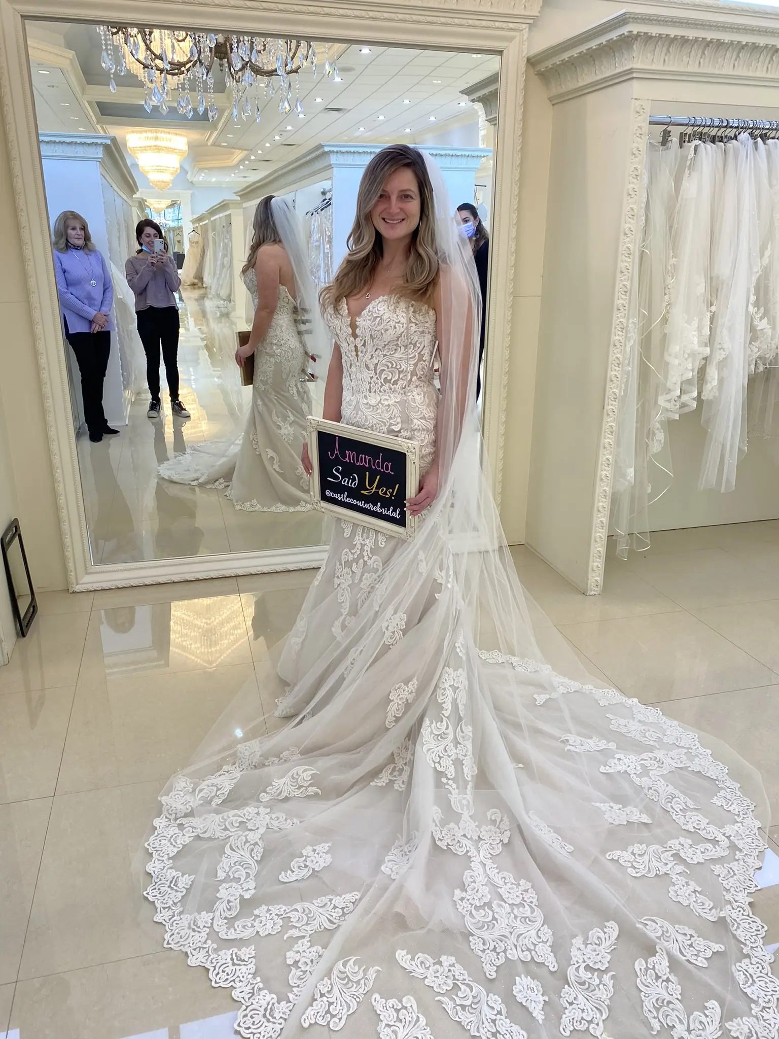 Bride in Retail Store In Sparkly Lace Fit-And-Flare Bridal Dress Called Fiona By Maggie Sottero