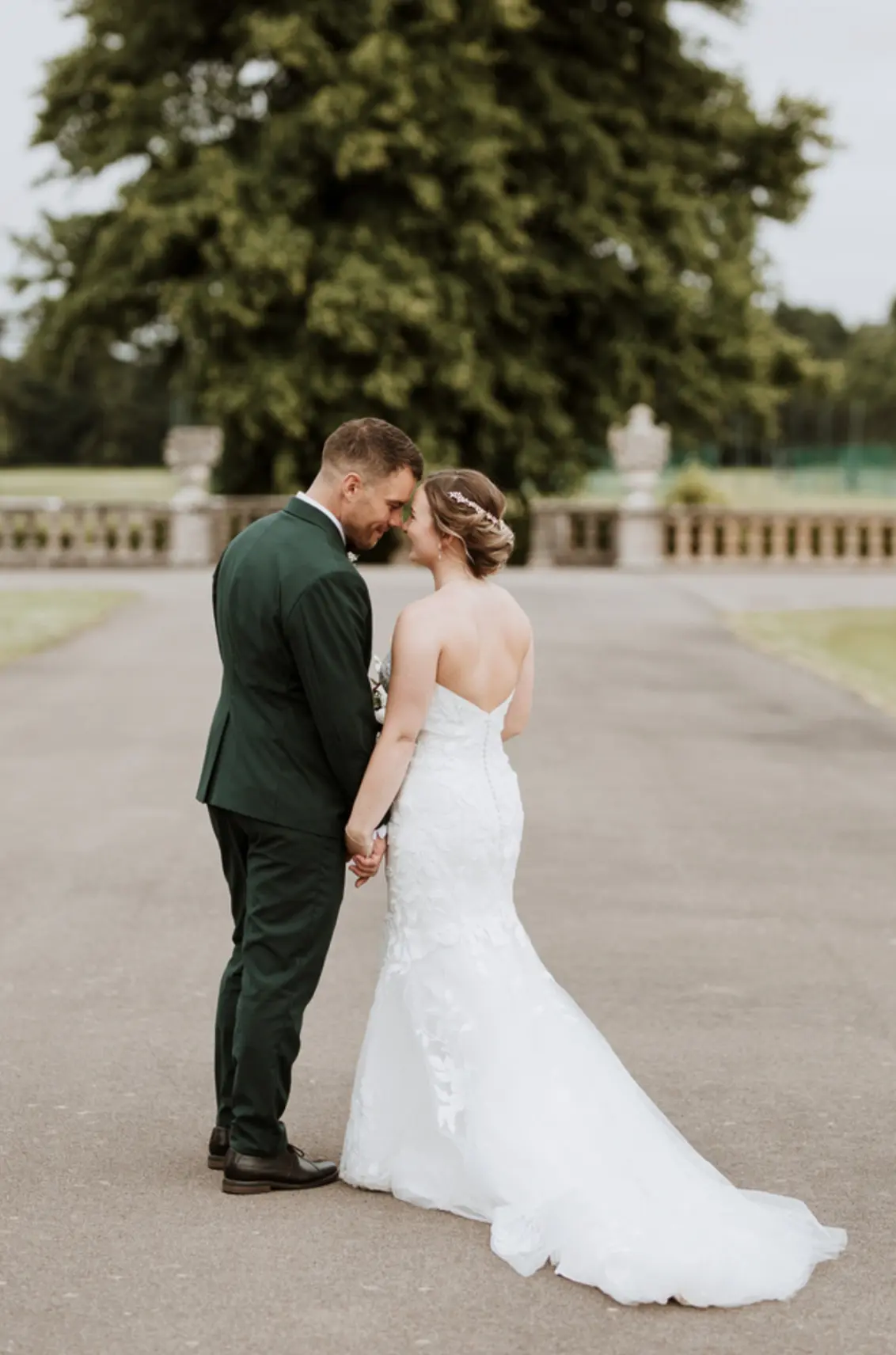 Groom With Bride Wearing Strapless Mermaid Wedding Dress With Oversized Lace Hattie By Rebecca Ingram