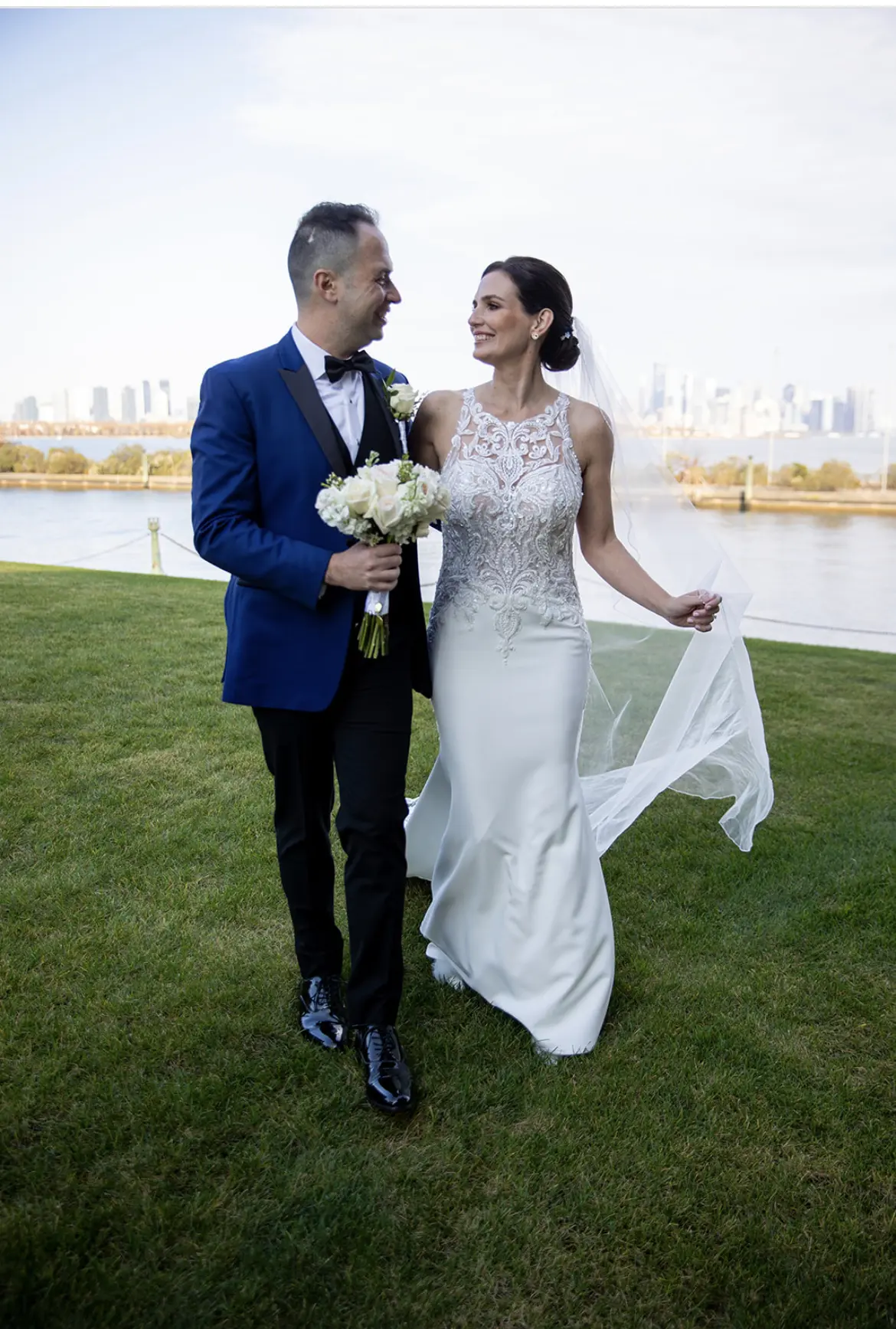 Groom With Bride Wearing Halter Style Crepe Wedding Dress Audrina By Maggie Sottero