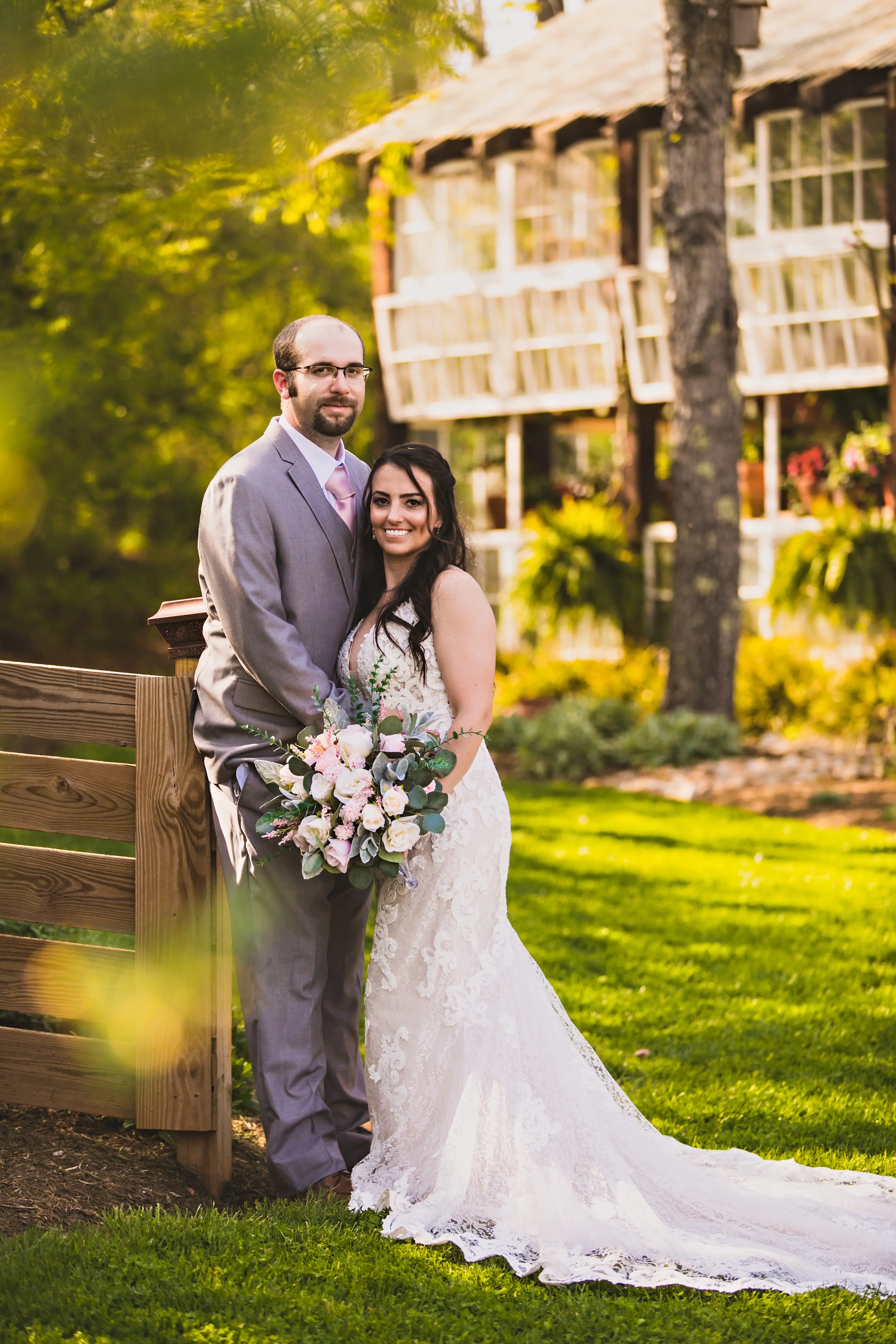 Groom with Bride in Shimmering Lace Motif Wedding Gown with Plunging Sweetheart Neckline Called Tuscany Lynette by Maggie Sottero