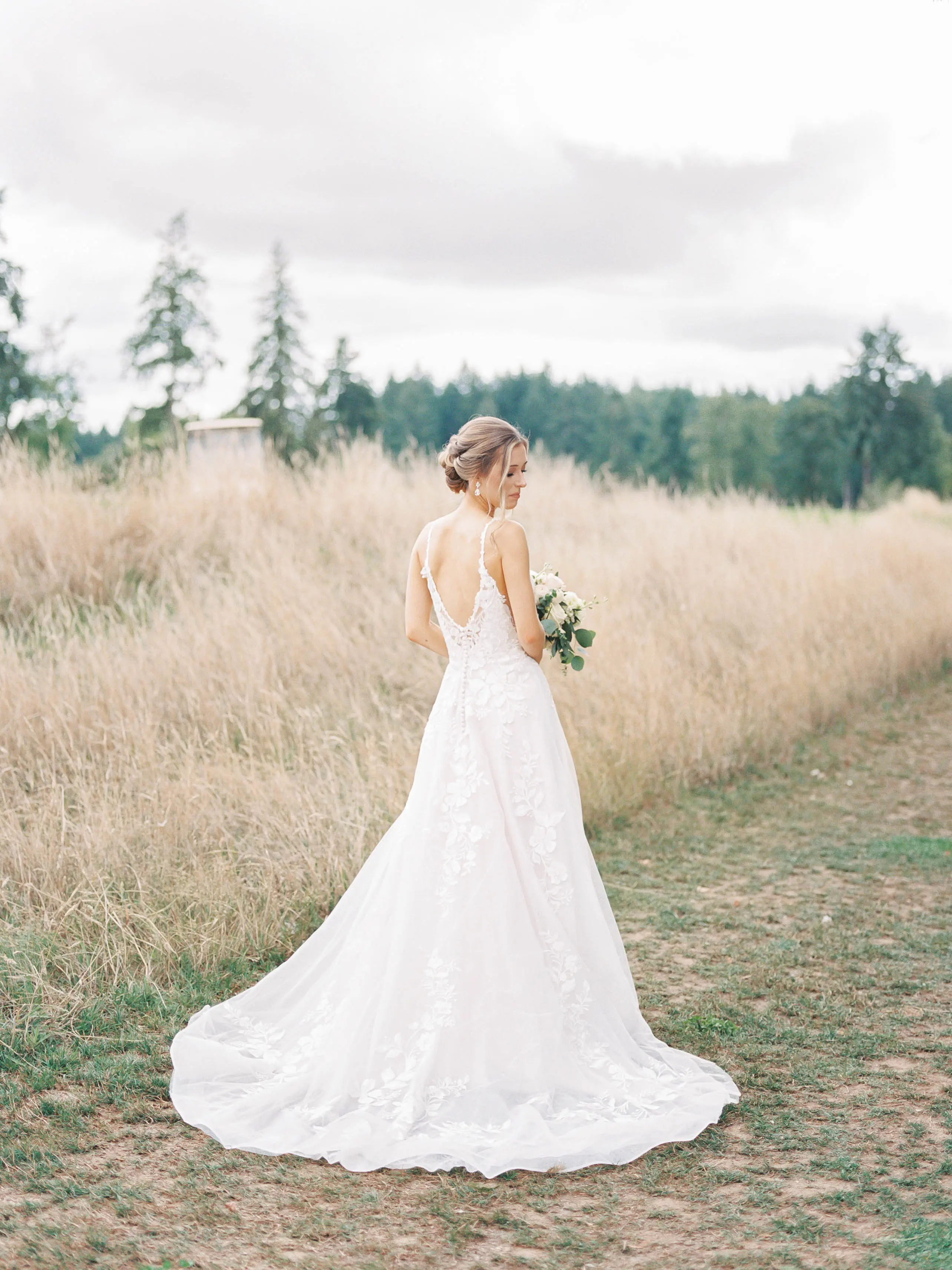 Bride wearing a budget friendly ballgown wedding dress