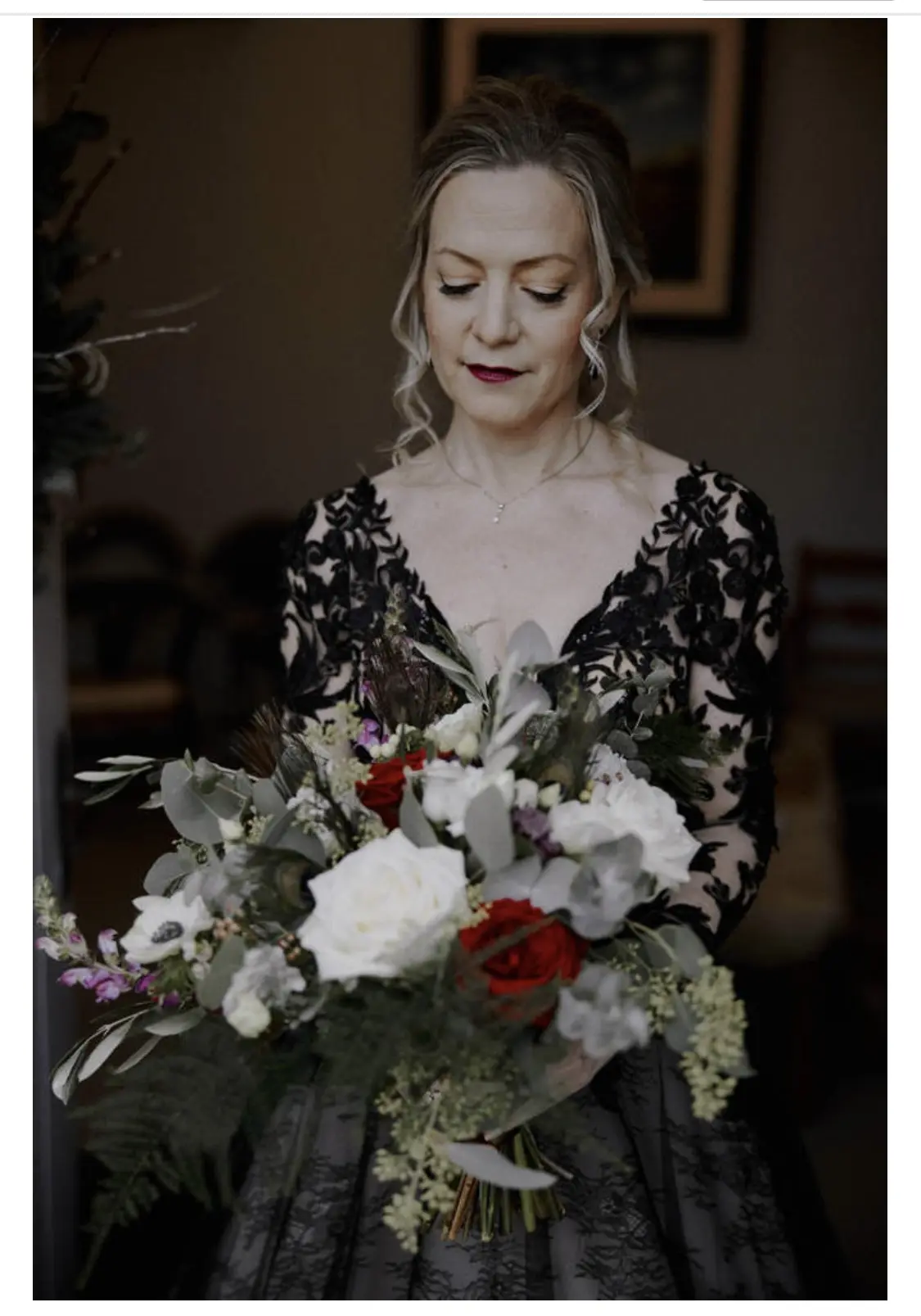 Bride Wearing Black Lace Wedding Gown Called Zander By Sottero and Midgley