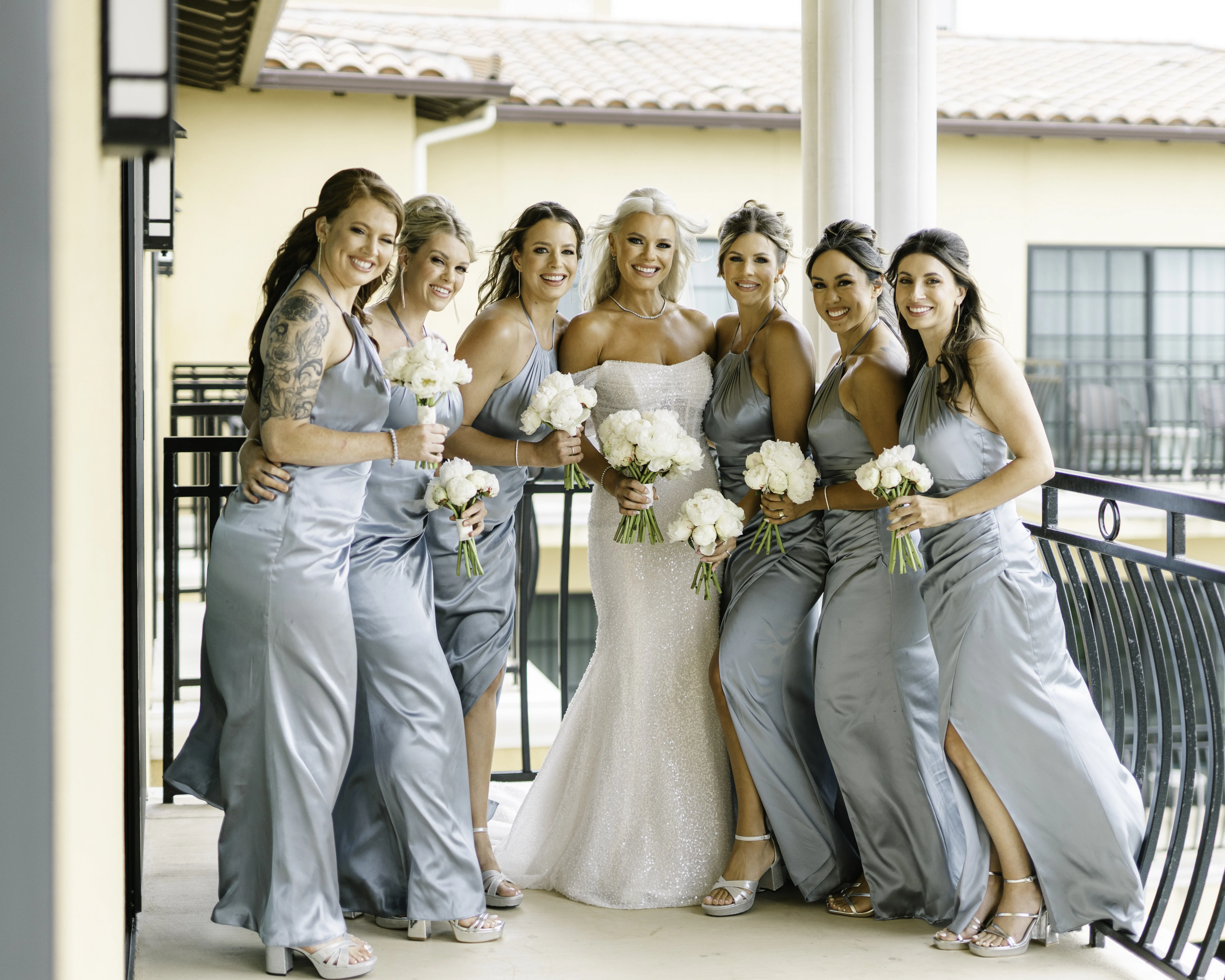 Bride Wearing Pearl Sparkly Bridal Gown Called Drew By Maggie Sottero With Bridesmaids