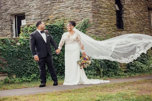 Groom With Bride Wearing Sheath Lace Long Sleeve Wedding Dress Althea By Maggie Sottero
