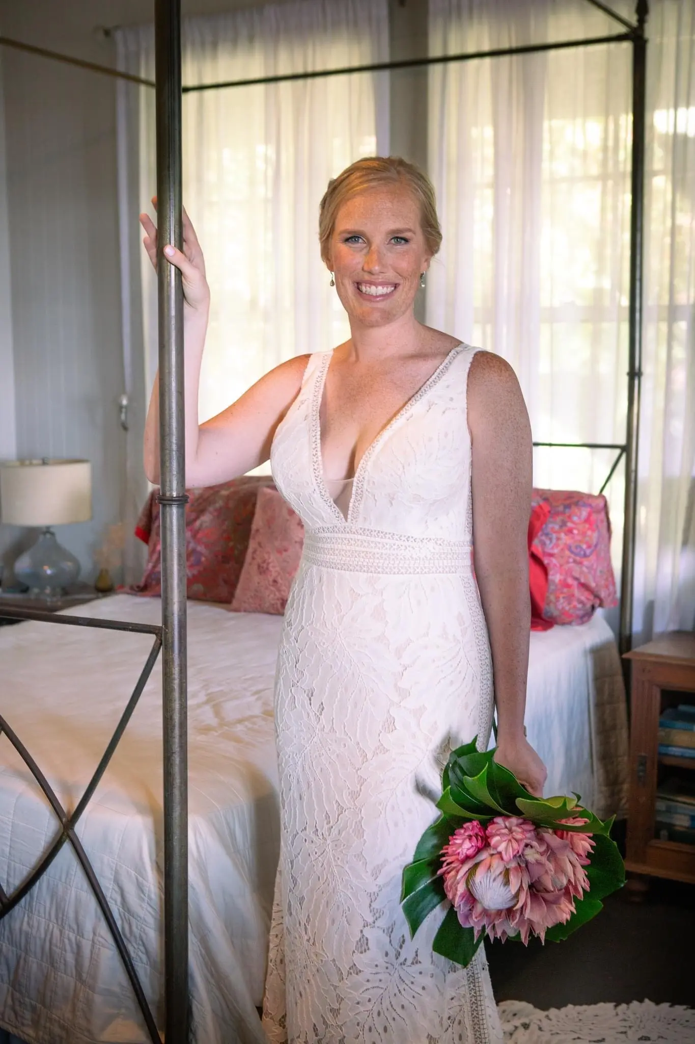 Real Bride in Boho Oversized Floral Lace Wedding Dress with Deep V-Neckline and Pearl Buttons Called Burke by Maggie Sottero