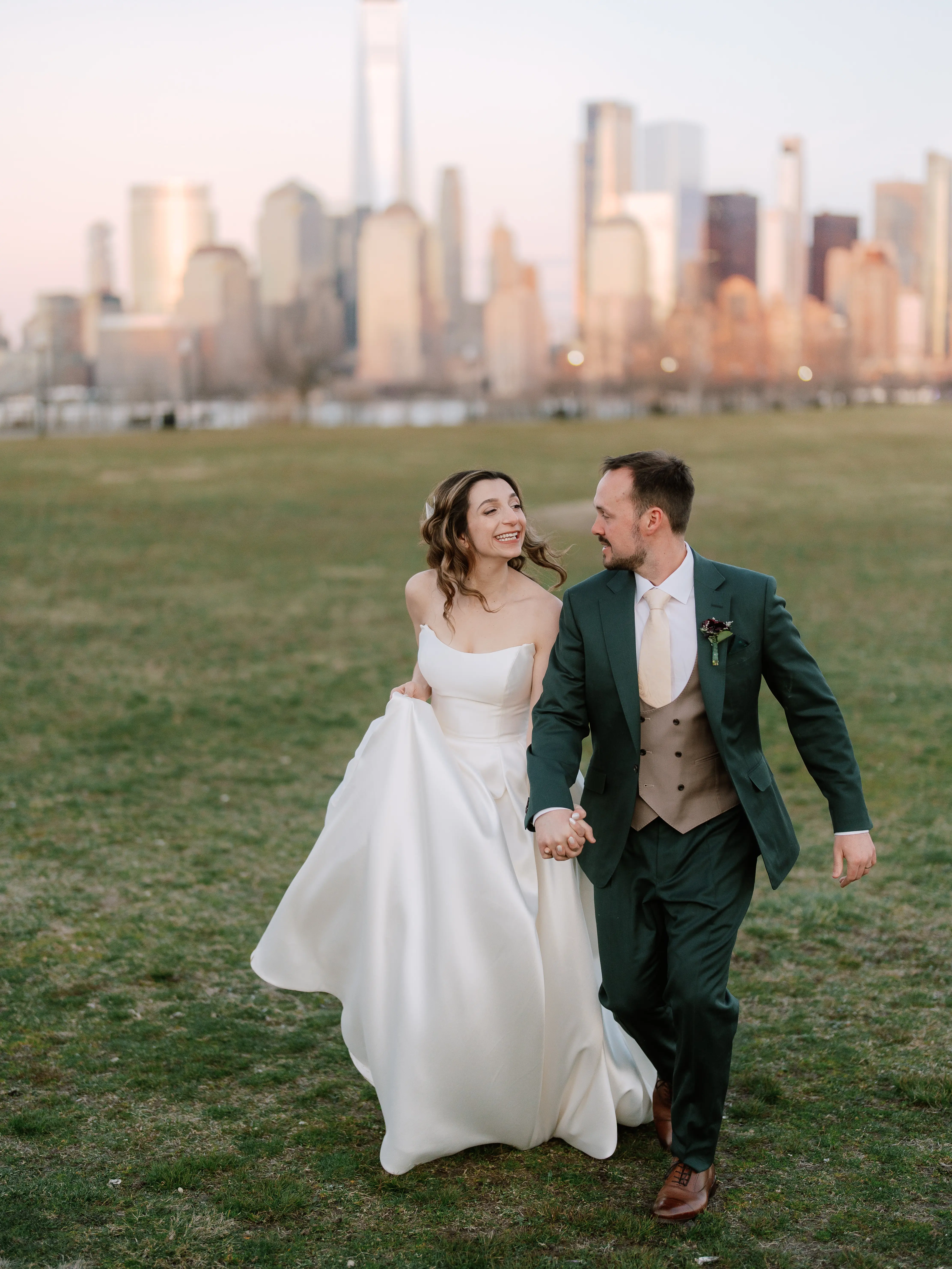 Bride wearing Selena by Maggie Sottero walking with her husband