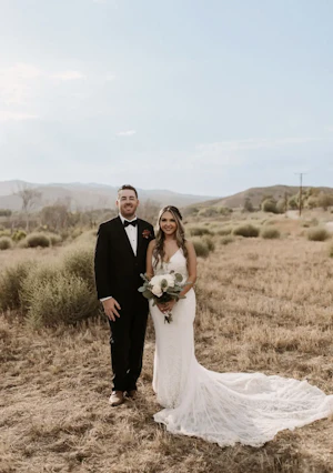 Bride In Beaded Fit-And-Flare Wedding Dress Called Barrett By Sottero And Midgley With Groom