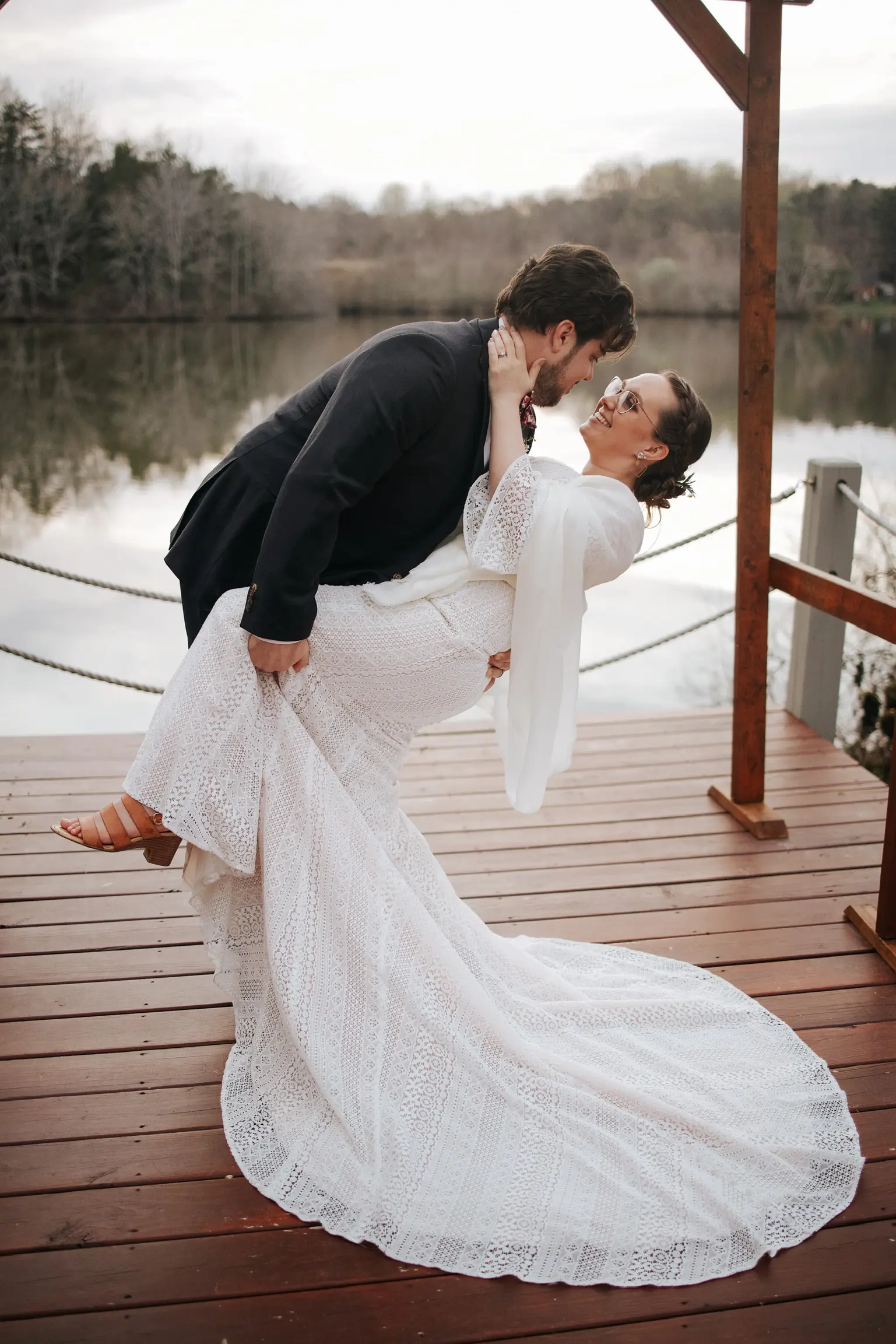 Groom with Bride in Geometric Allover Lace Wedding Dress with Sweetheart Neckline Called Dover by Maggie Sottero