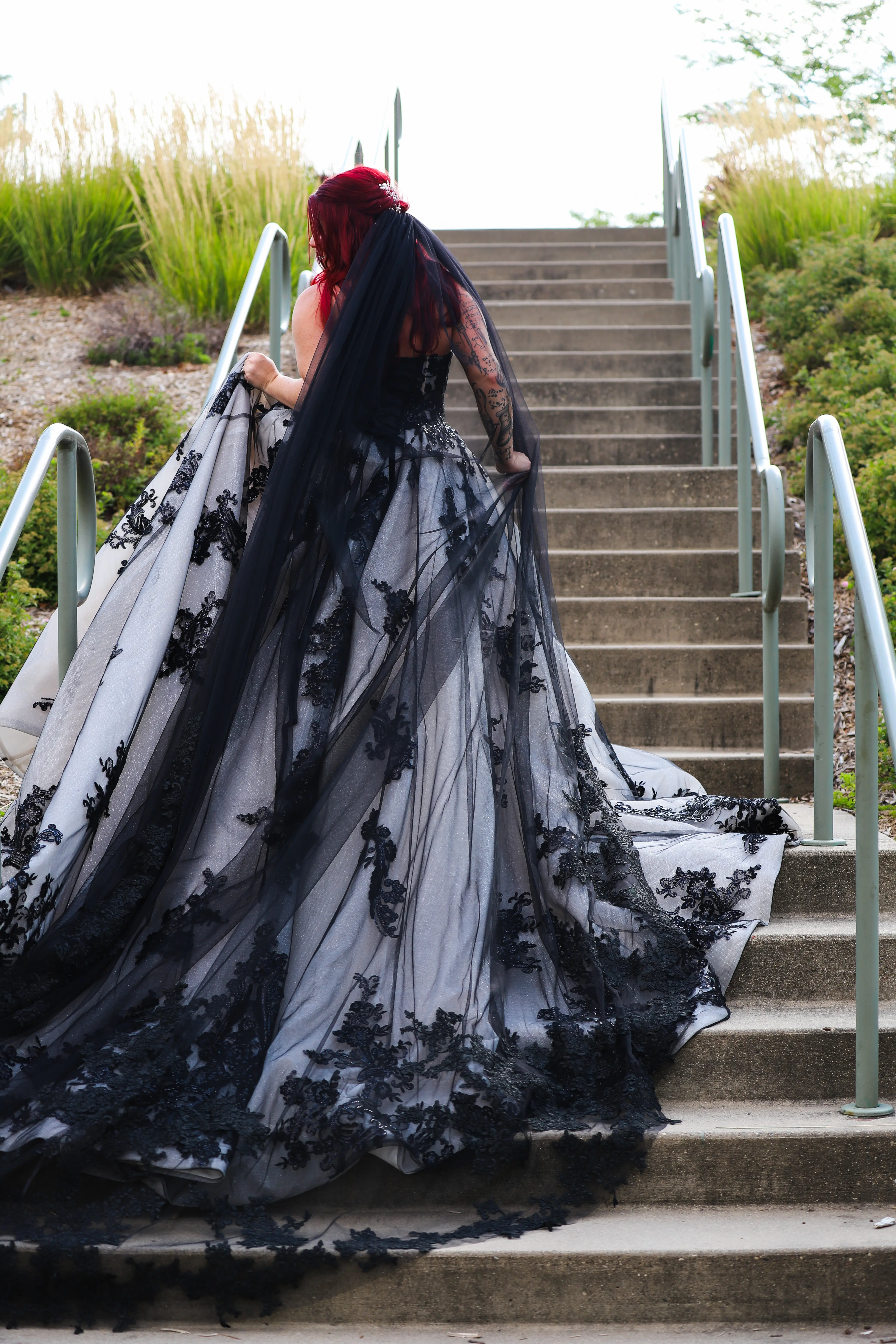 Bride Wearing Royal-Inspired Ball Gown Wedding Dress In Black Lace Called Norvinia By Sottero And Midgley