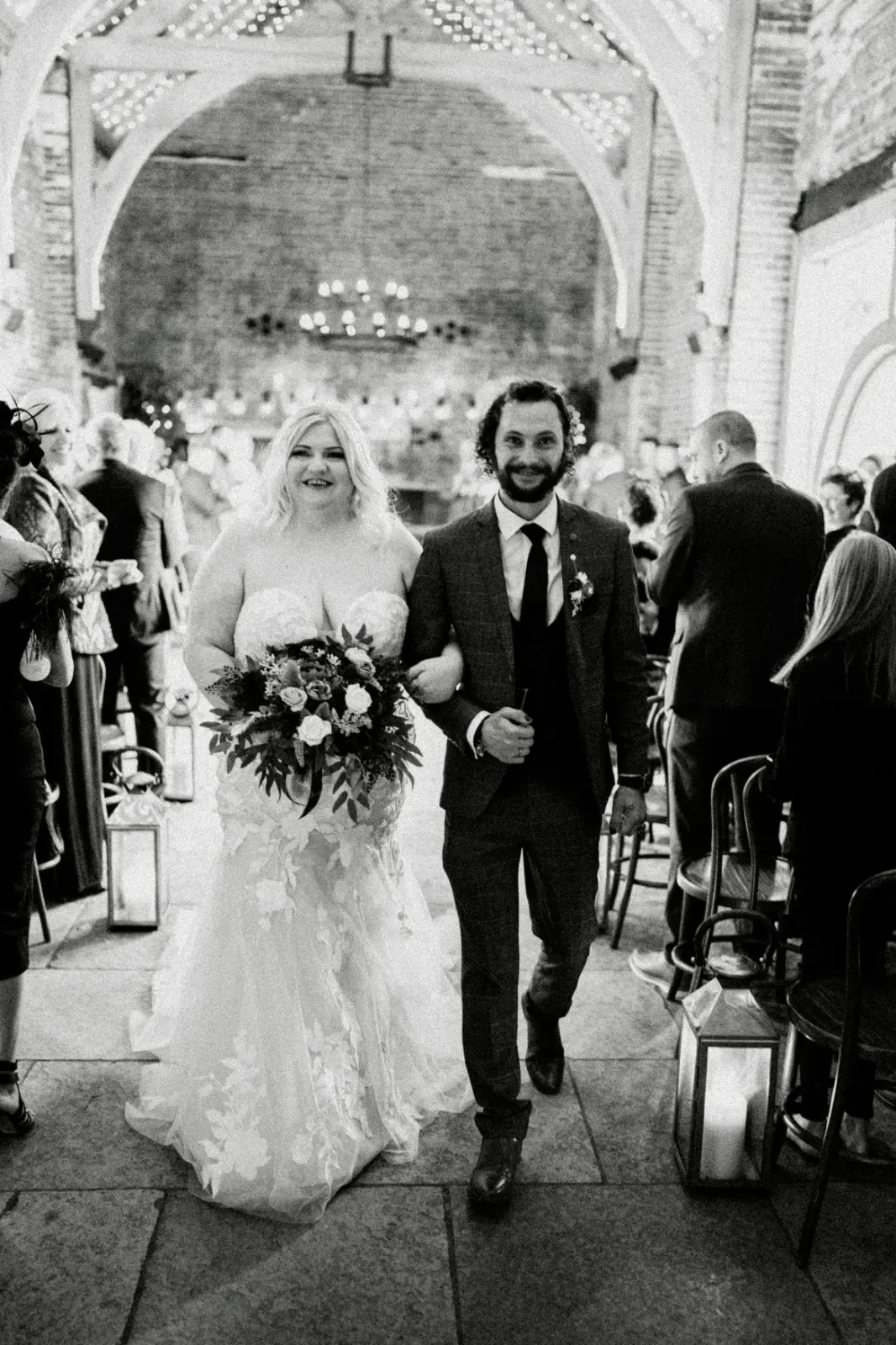 Bride Wearing Lace Mermaid Wedding Dress Called Hattie By Rebecca Ingram Walking Down The Aisle With Groom