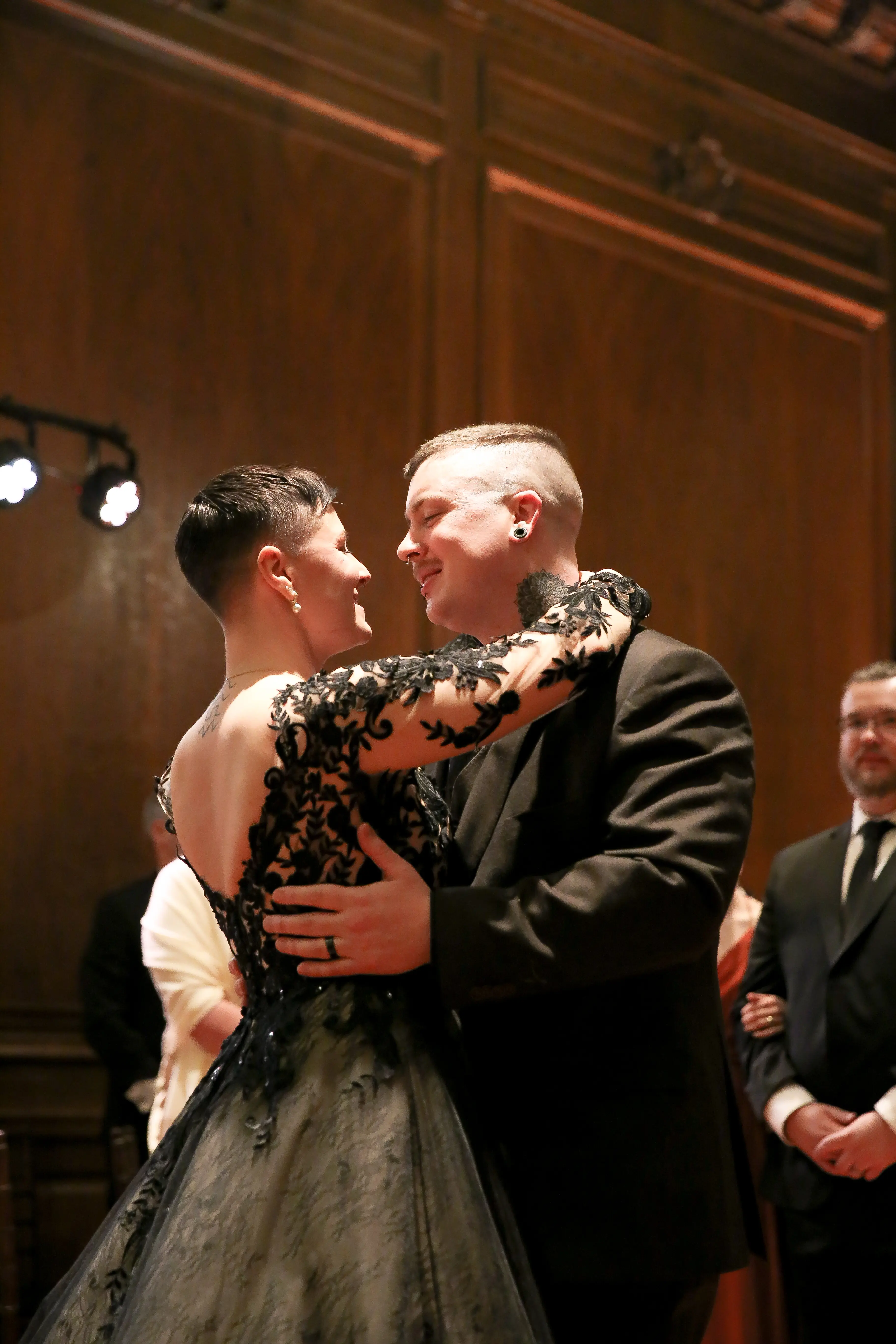 Groom Dancing With Bride In Black Wedding Dress Named Zander By Sottero and Midgley