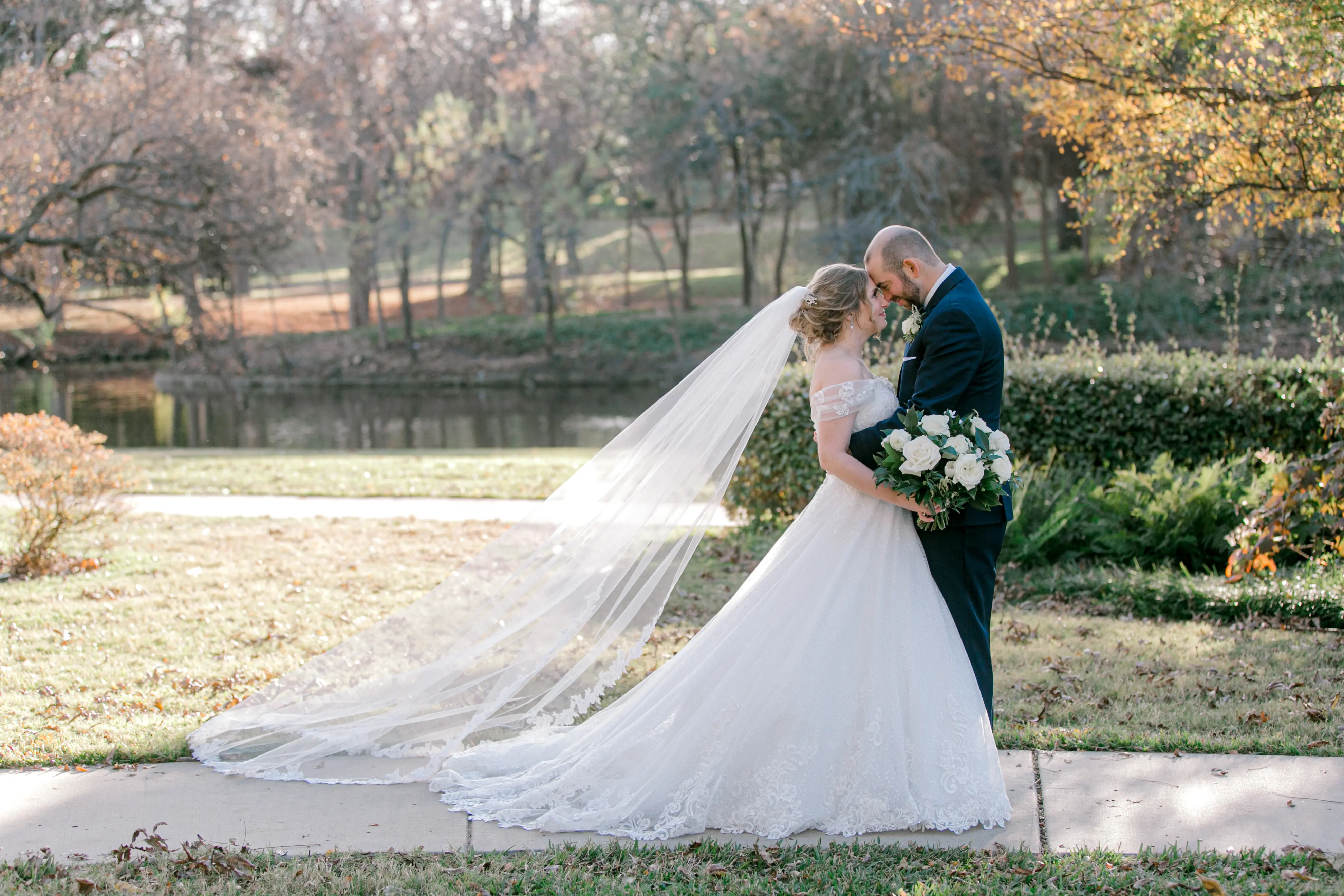Groom Smiling At Bride In Chic Lace Ball Gown Wedding Dress Called Tristyn By Maggie Sottero