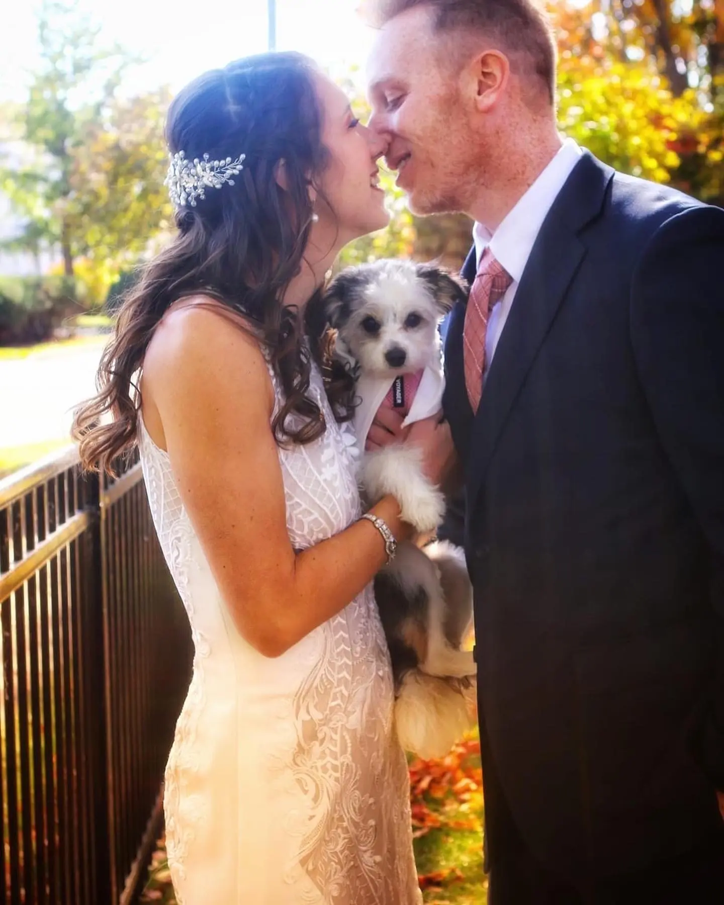 Real Bride in Halter Fit-and-Flare Crepe Wedding Dress with Layers of Sheer Lace and Lace Motifs Called Kevyn by Sottero & Midgley