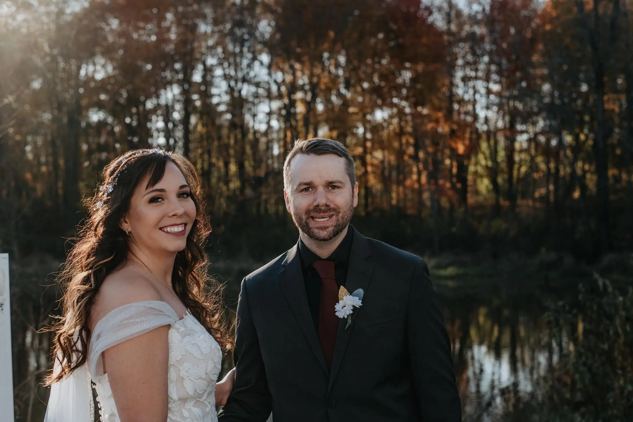 Groom with Bride in Strapless Mermaid Bridal Gown with Sweetheart Neckline Called Hattie by Rebecca Ingram
