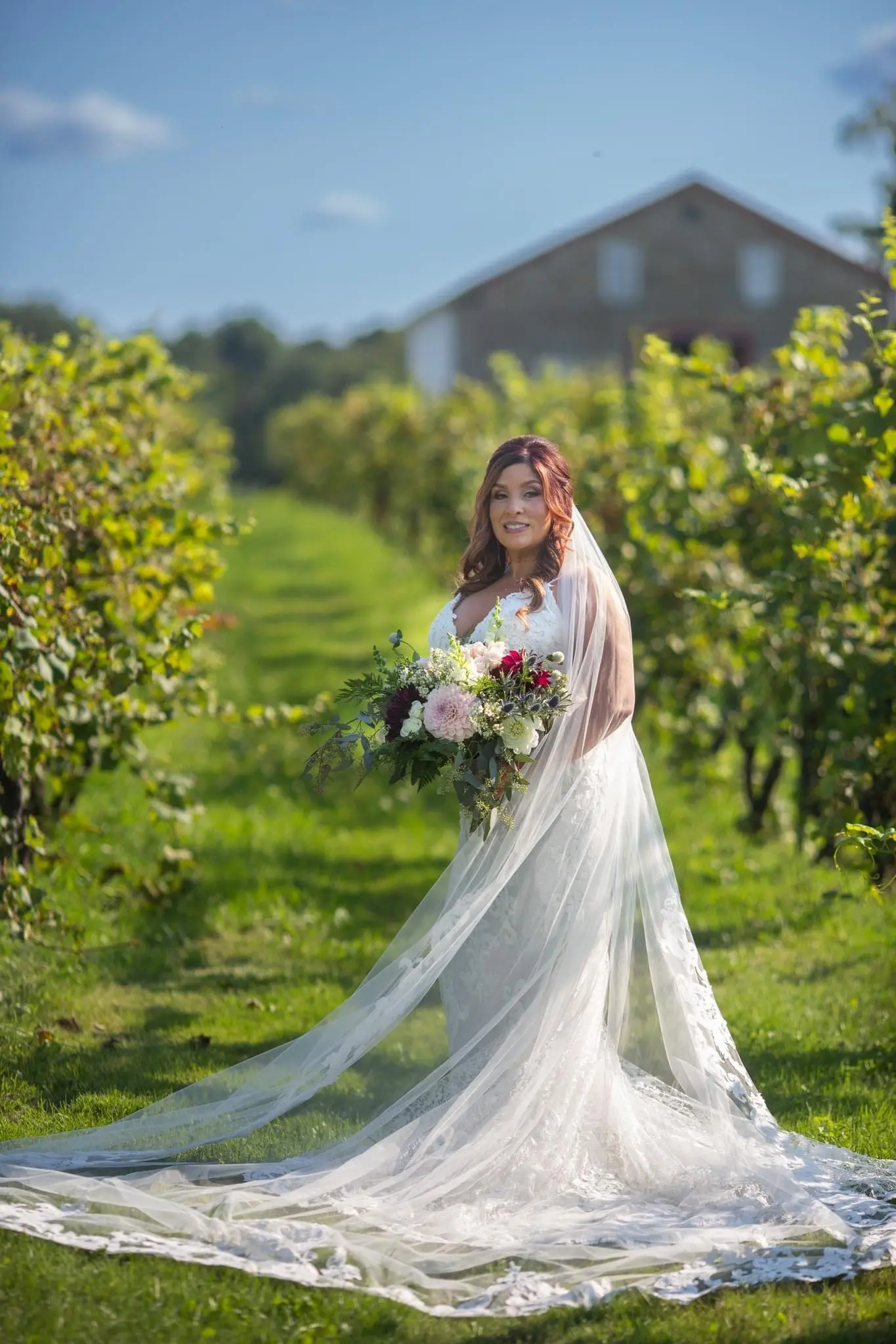 Bride Wearing Sexy Mermaid Wedding Dress Called Tuscany By Maggie Sottero With Long Veil