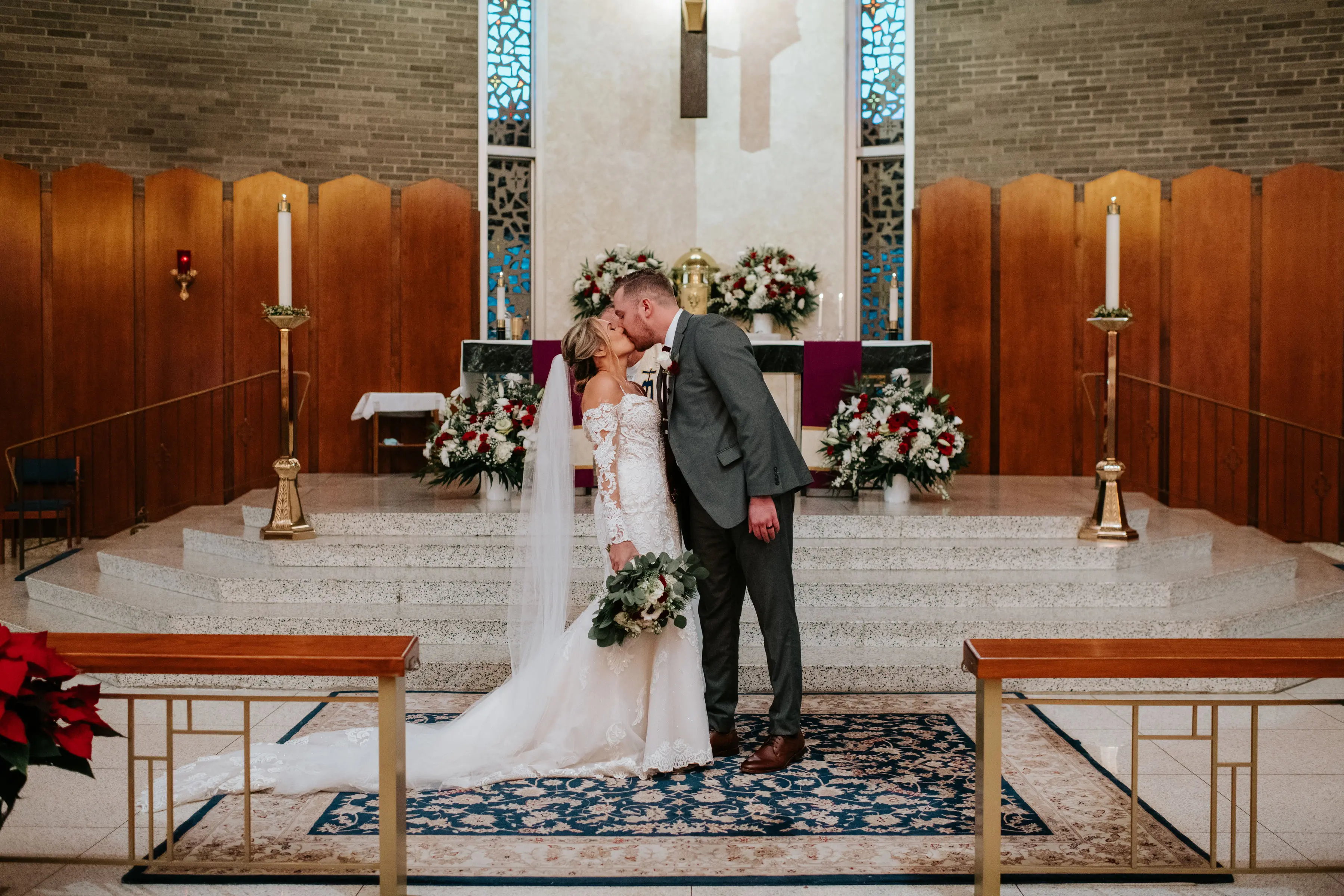 Groom Kissing Bride in Sparkly Lace Fit-and-Flare Bridal Dress with Off-the-Shoulder Sleeves Called Fiona by Maggie Sottero