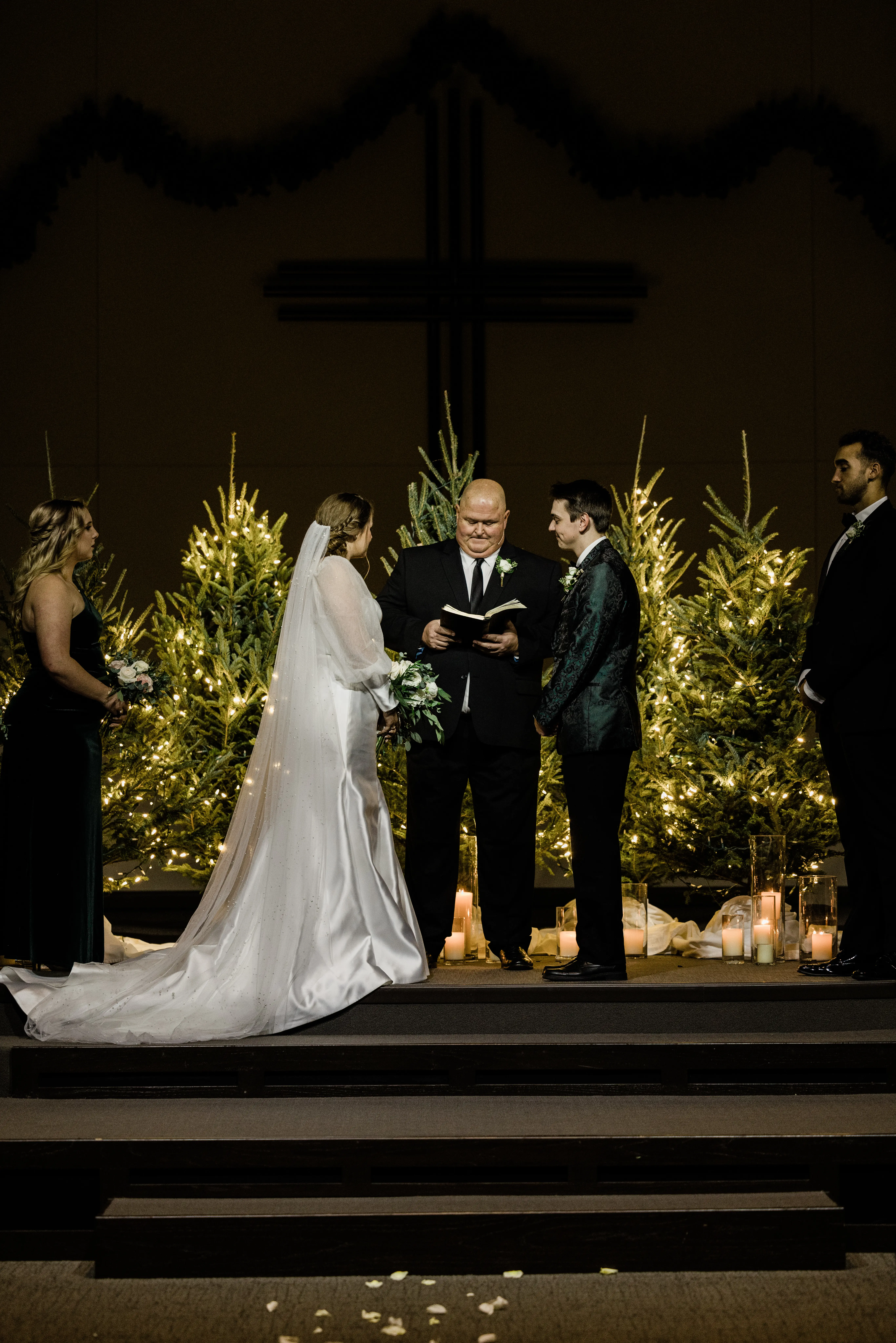 Bride And Groom Standing Together At The Altar. Bride Wearing Glamorous Mikado Mermaid Wedding Dress Called Pippa By Rebecca Ingram