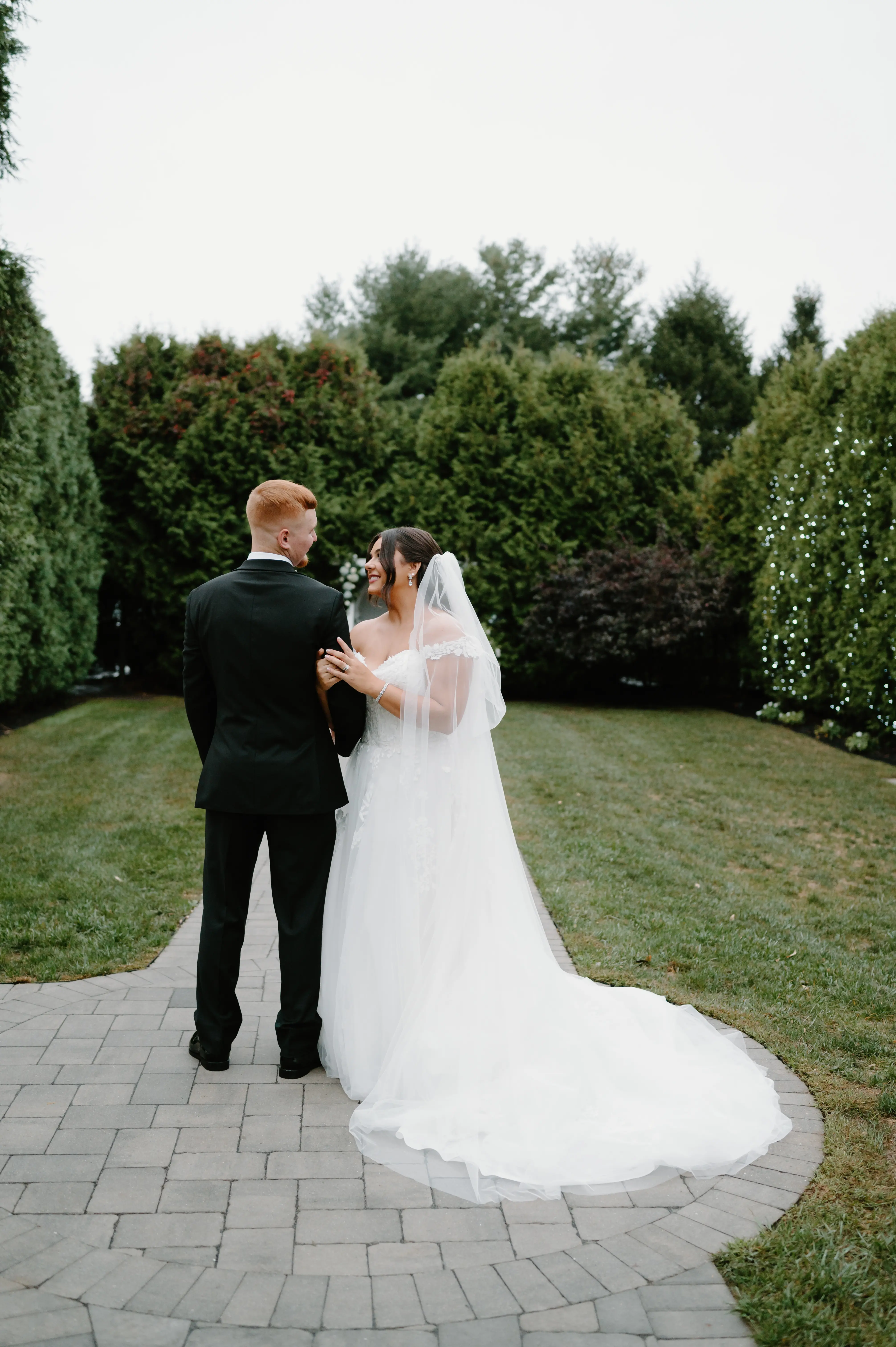 Bride Wearing Lace Princess Dress Called Harlem By Maggie Sottero Holding Groom