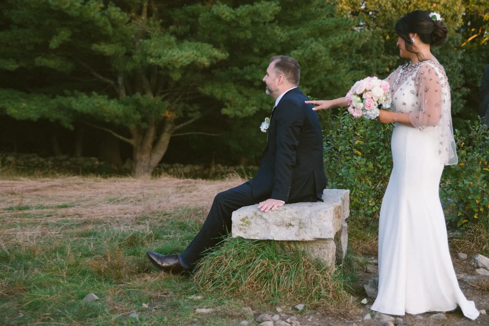 Groom and Bride Wearing Minimalist Crepe Fit-and-Flare Wedding Dress Called Fernanda by Maggie Sottero