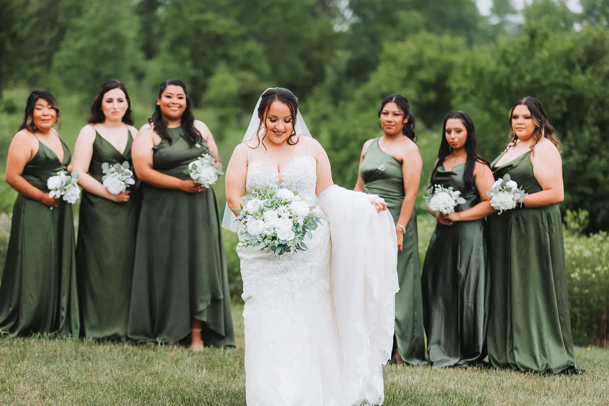 Bride wearing Fiona wedding dress by Maggie Sottero with her bridesmaids