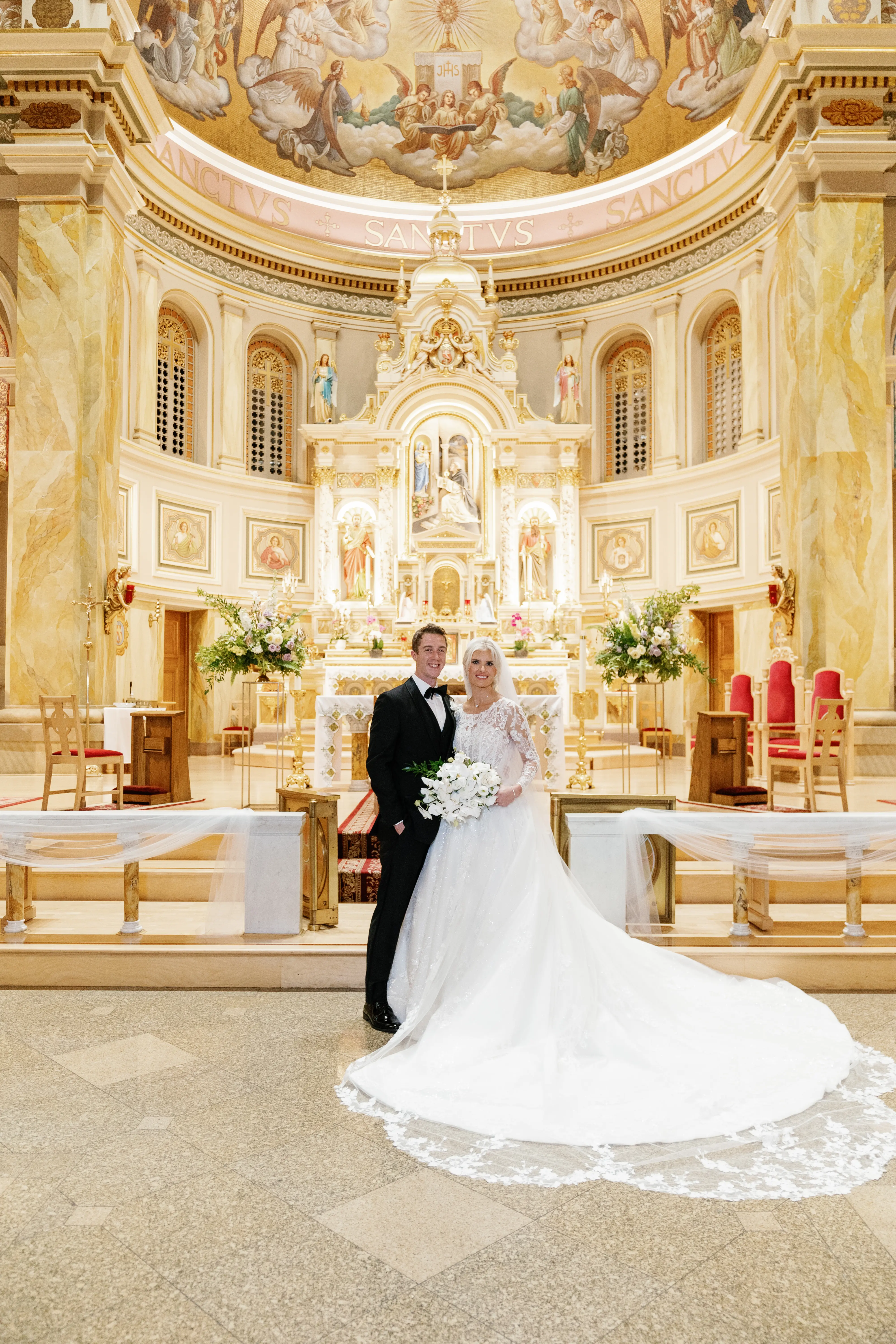 Bride Wearing Lace Princess Wedding Dress Called Norvinia By Sottero And Midgley With Groom In A Chapel