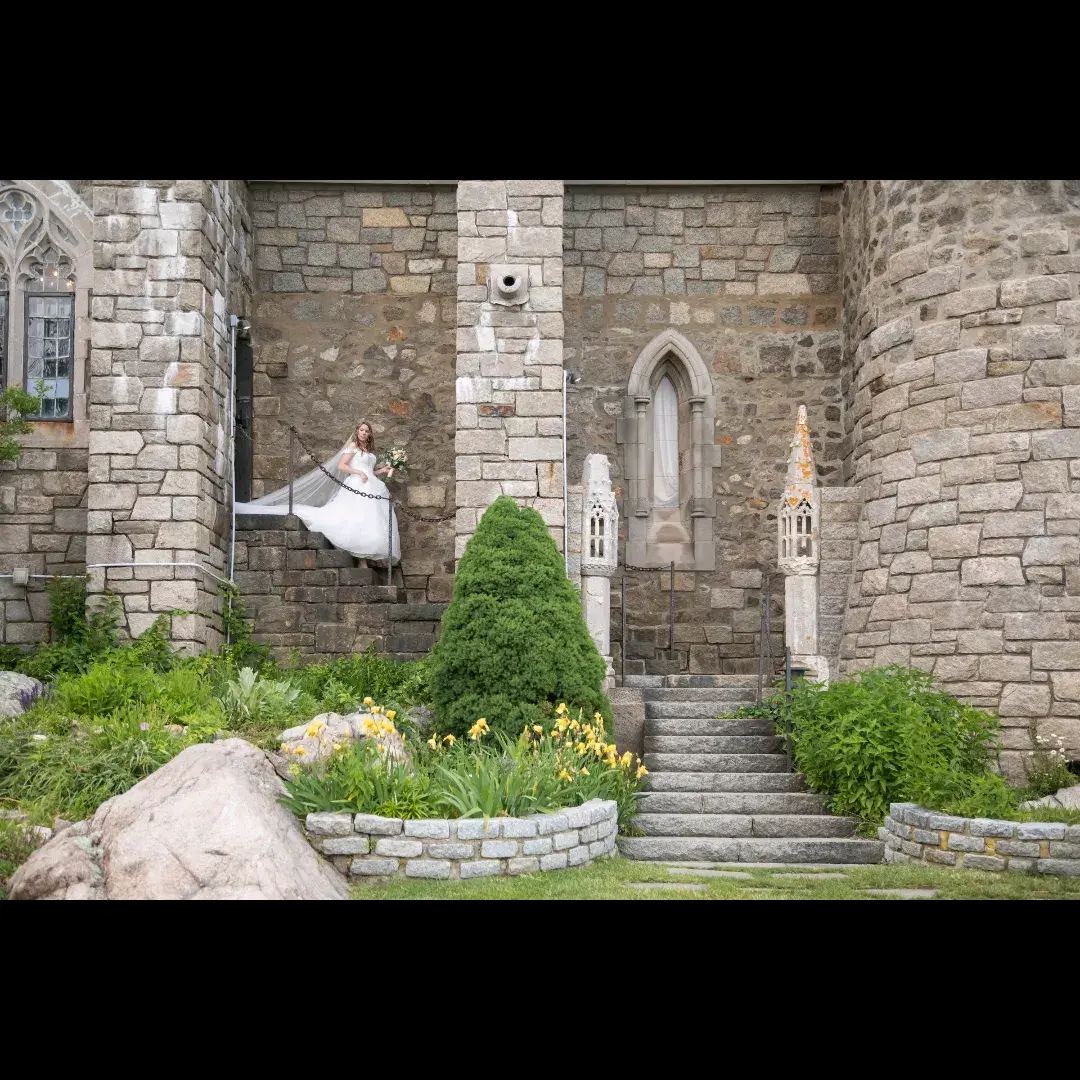 Bride wearing Harlem wedding dress by Maggie Sottero walking down stairs