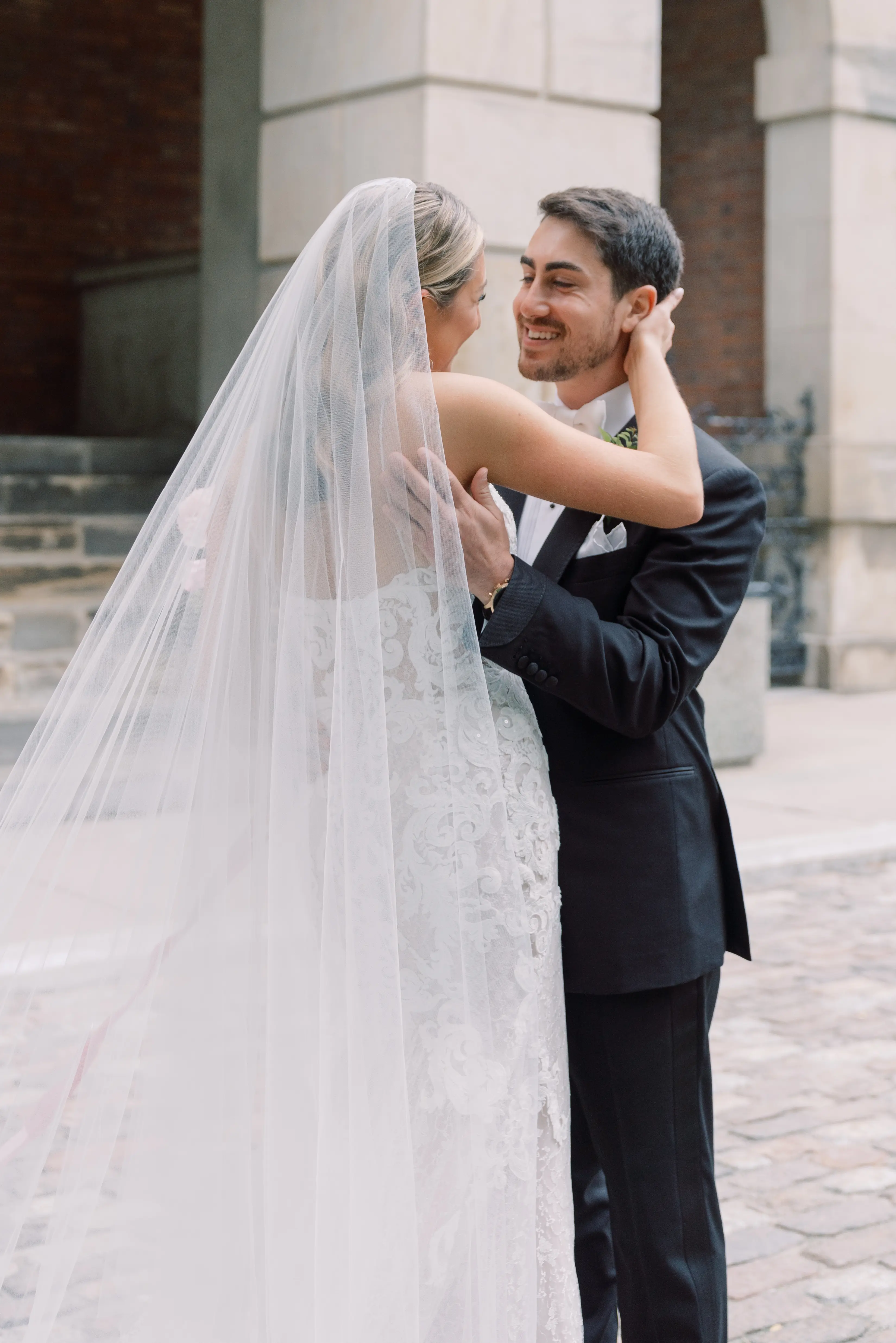 Groom With Bride Wearing Lace Sheath Wedding Dress Tuscany Lynette By Maggie Sottero
