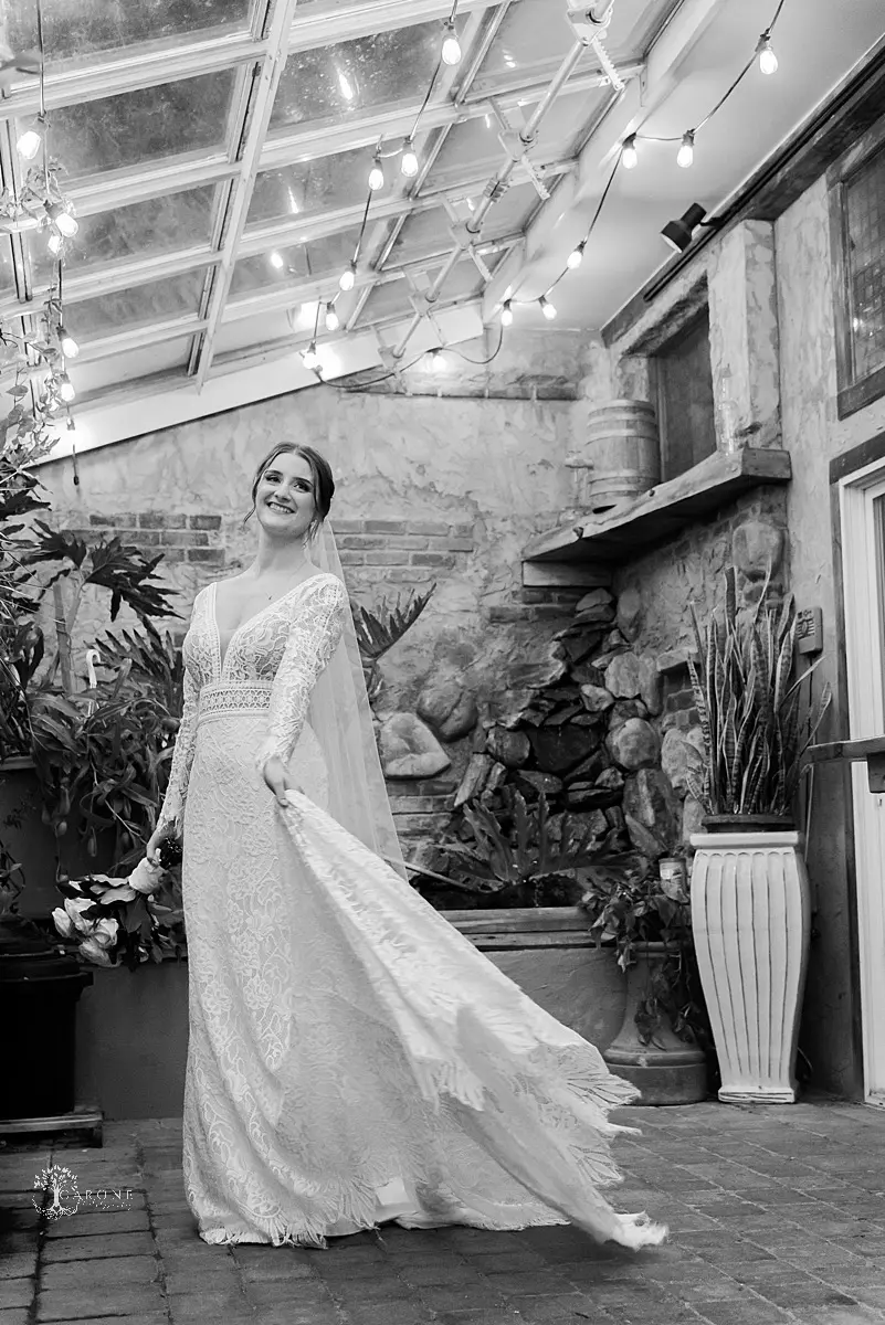 Bride Wearing Boho Sleeved Wedding Dress Called Drita By Maggie Sottero