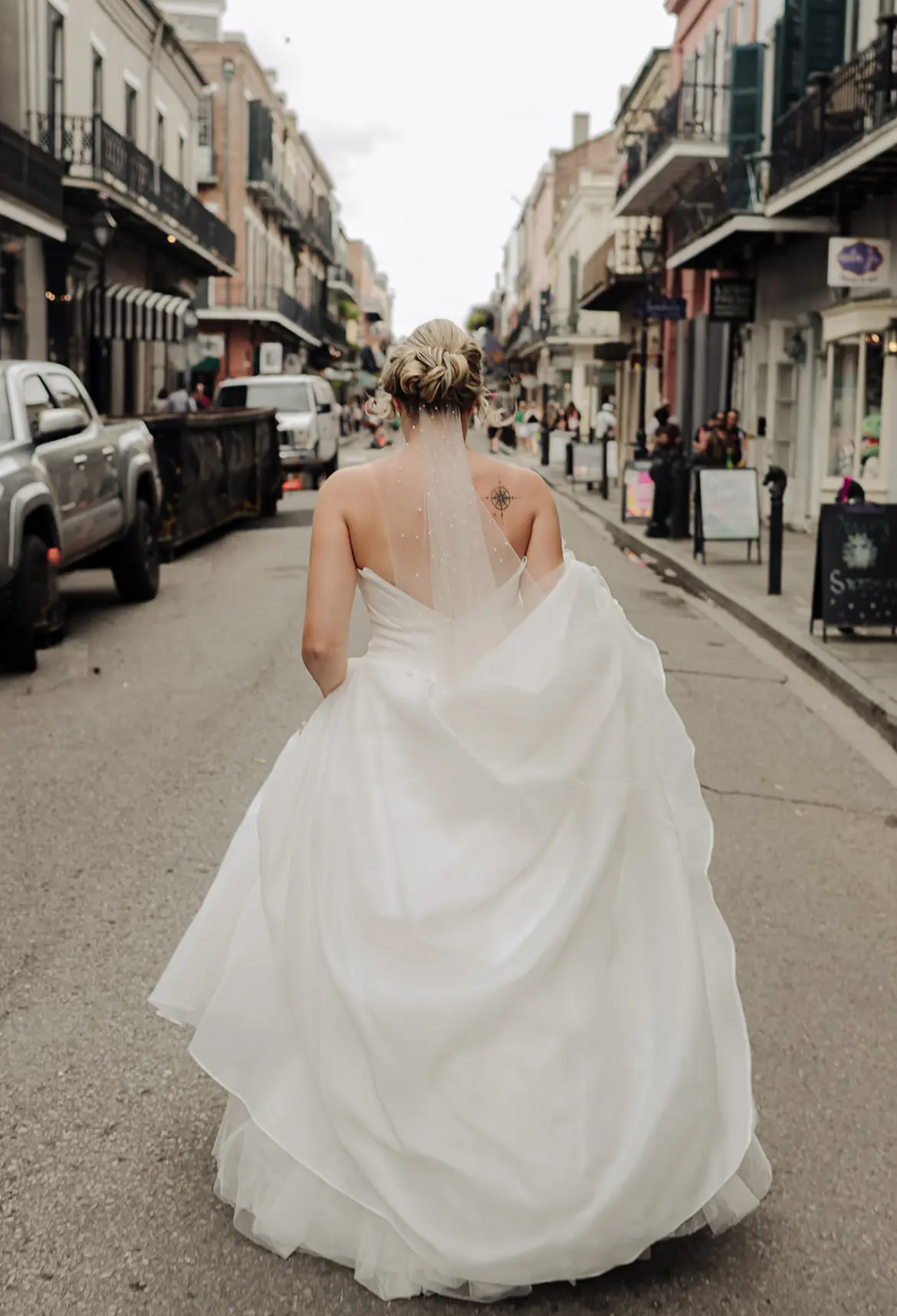 Bride Wearing Modern Princess Wedding Dress Called Aubrielle By Maggie Sottero Walking Through The Streets Of New Orleans