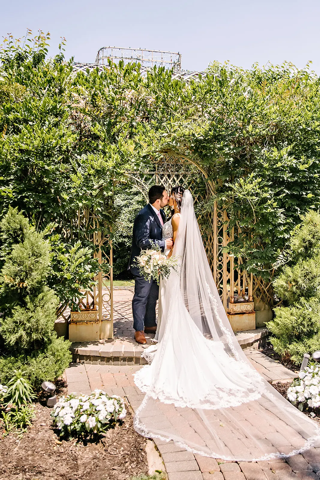 bride in lace crepe sheath wedding dress