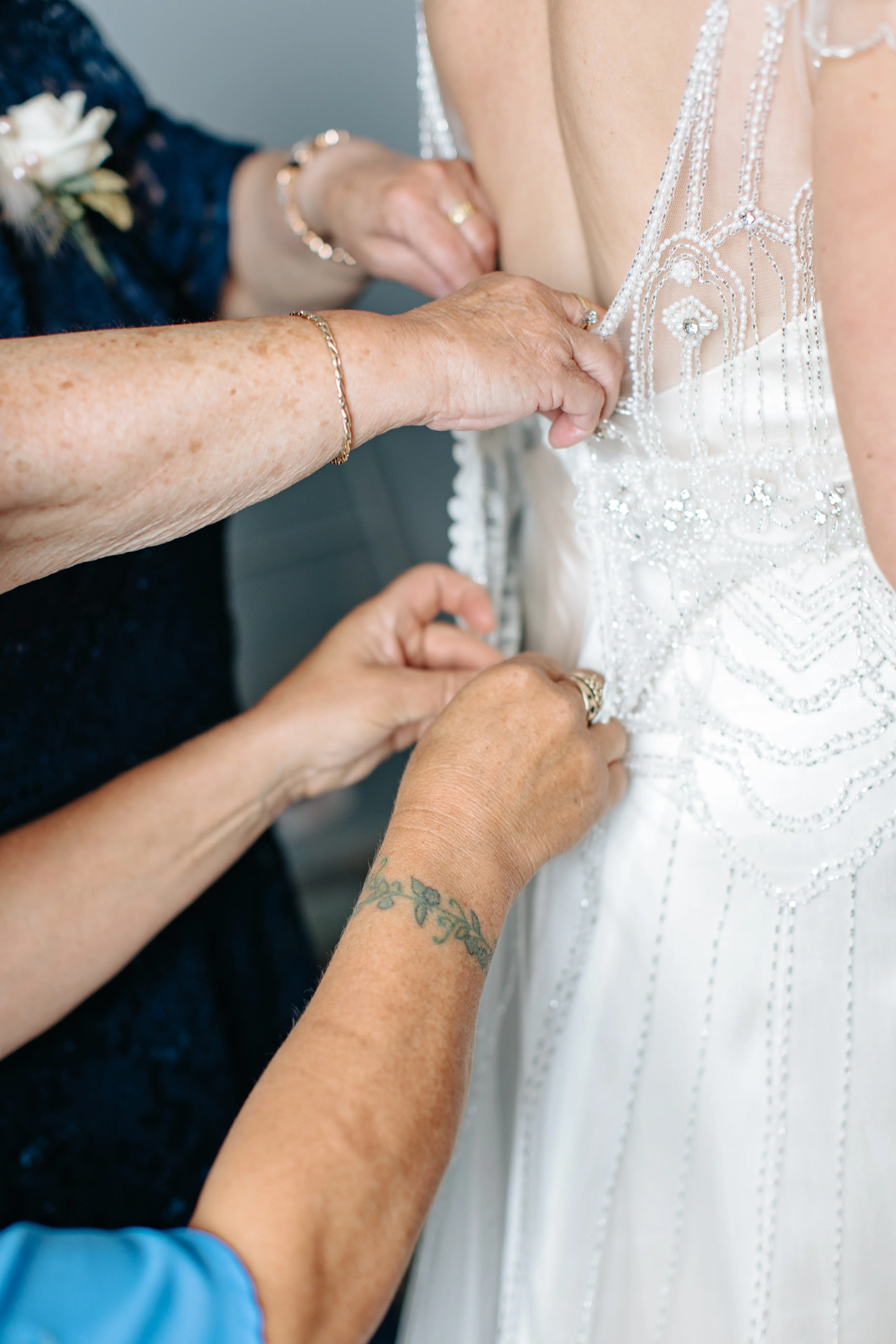 Bride Wearing Ivory Satin Sheath Wedding Dress Ettia By Maggie Sottero