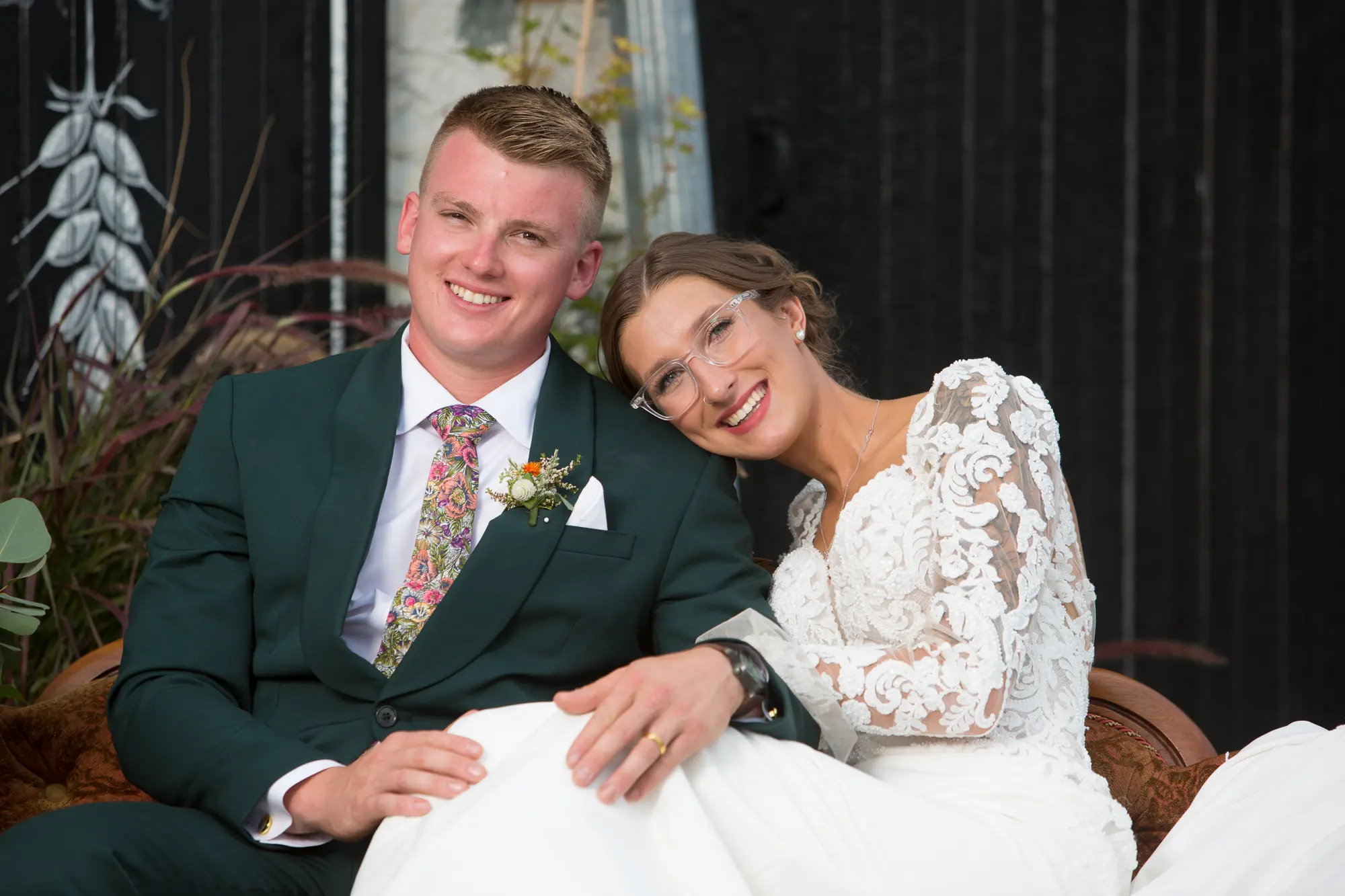Bride Wearing Lace Mermaid Wedding Gown Called Nikki By Maggie Sottero Sitting With Groom