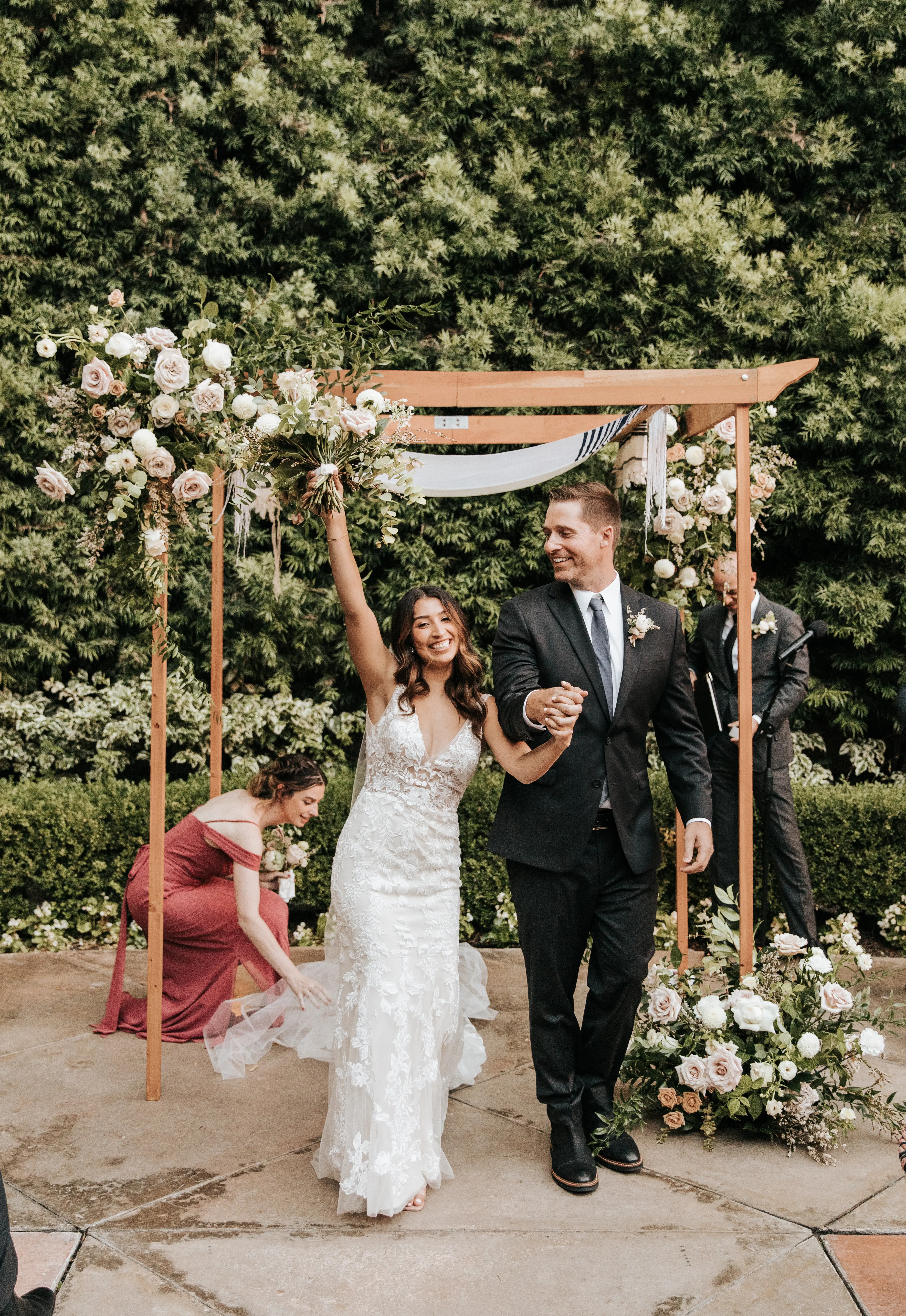 Bride with groom wearing floral fit and flare wedding dress